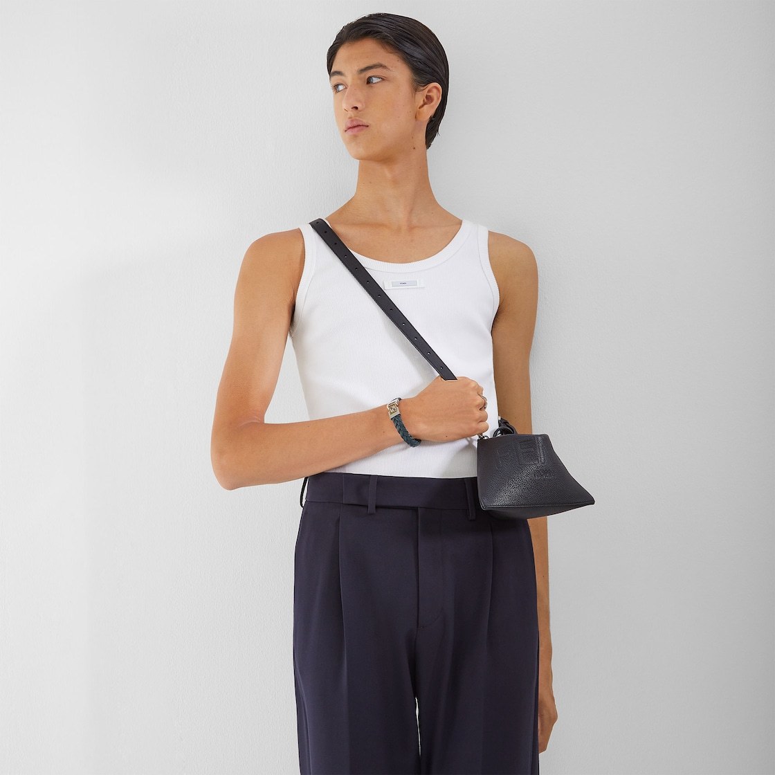 Fendi Logo-embossed Leather Messenger Bag In Black