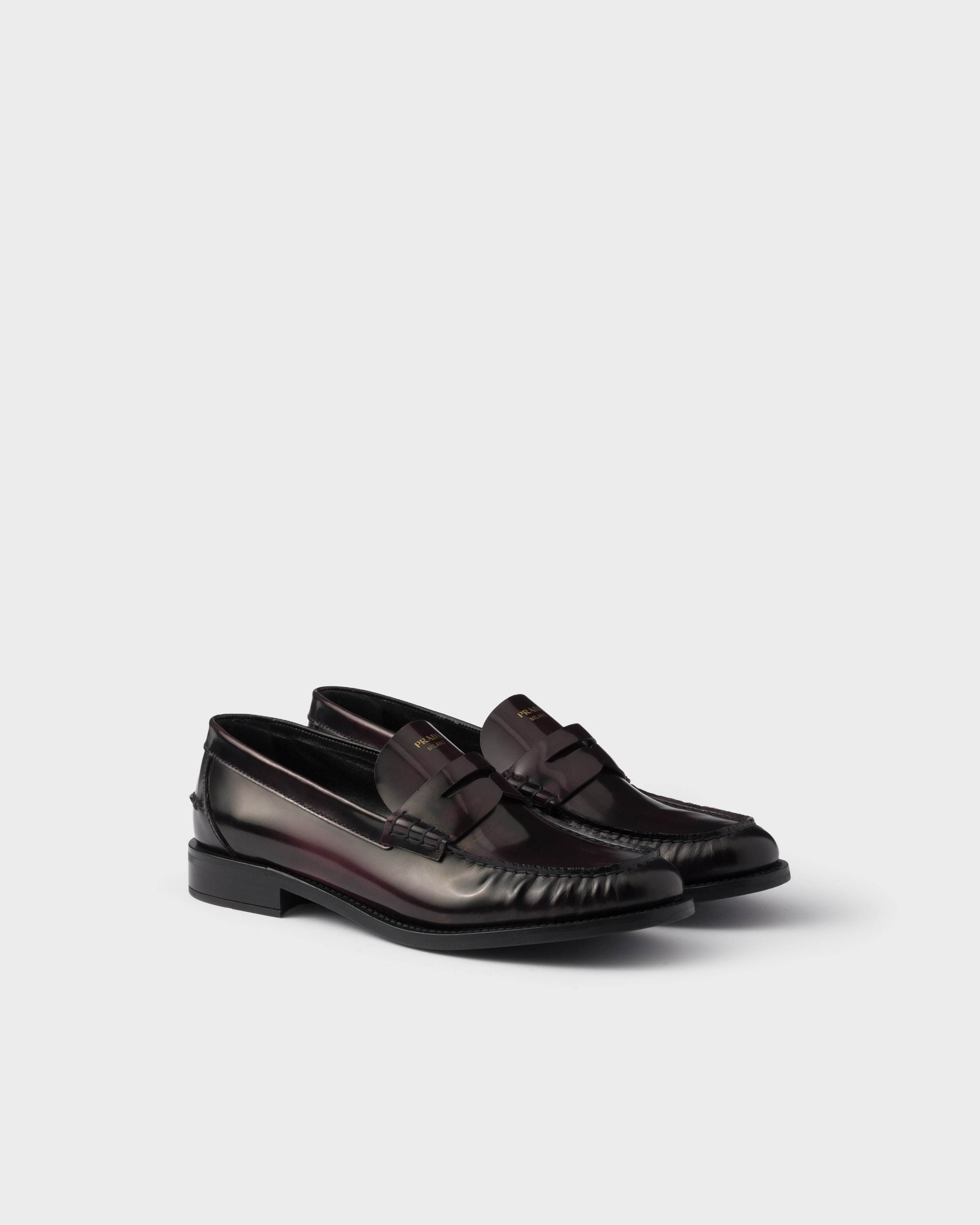 Prada Brushed Leather Loafers In Black