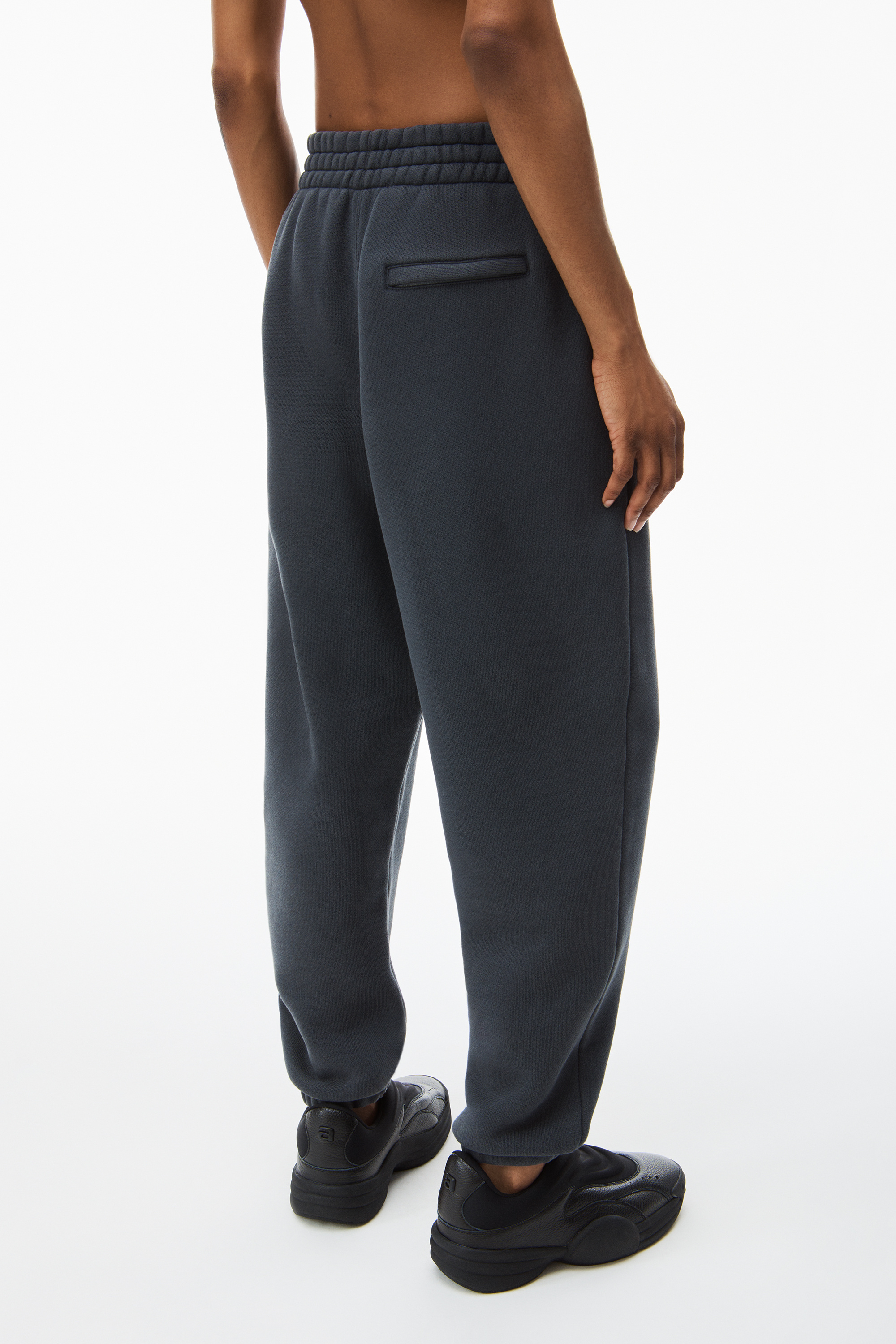 ALEXANDER WANG RUBBERISED-LOGO COTTON-BLEND TRACK PANTS 