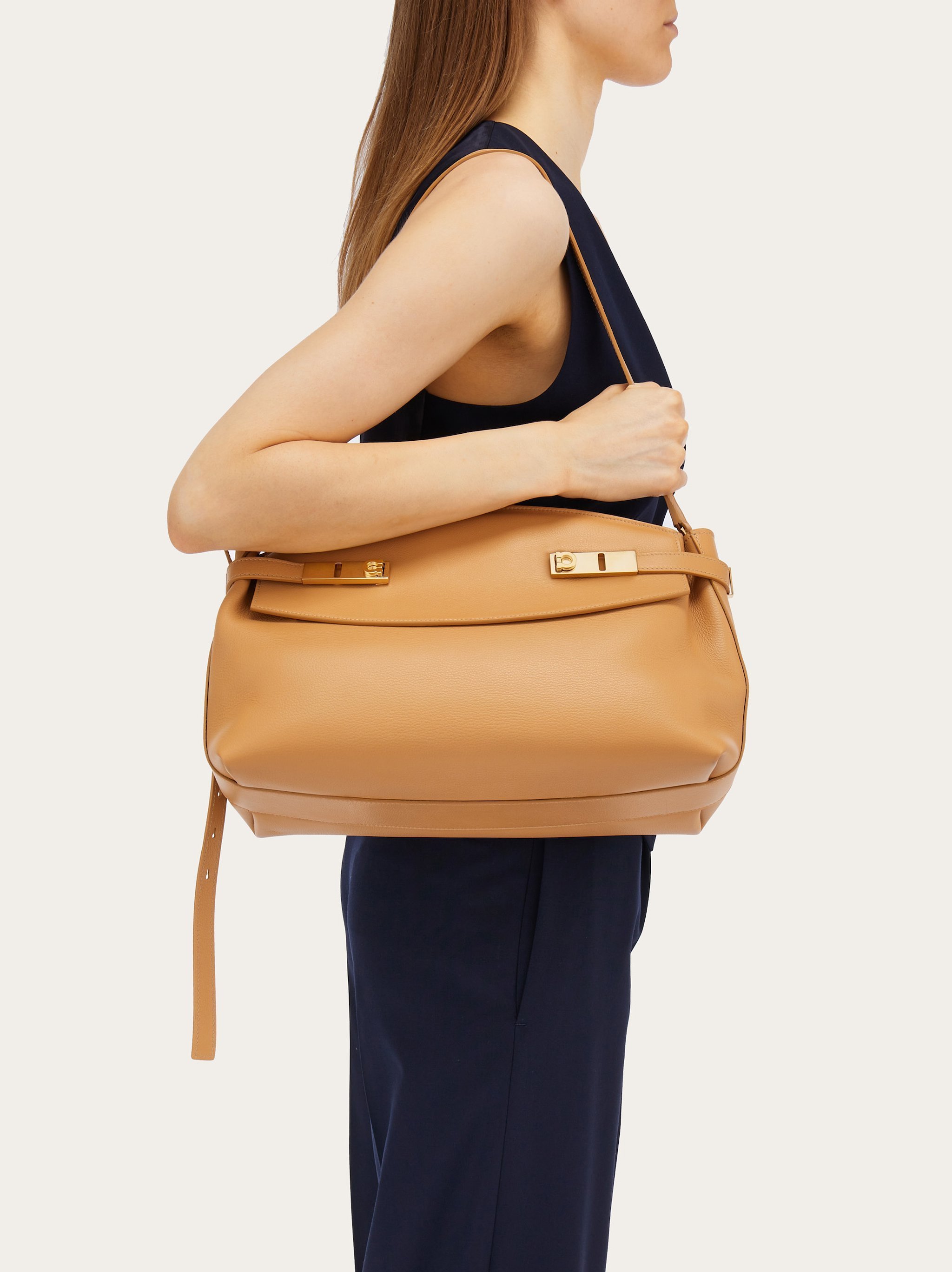 Ferragamo Large Pouch Leather Bag In Nude