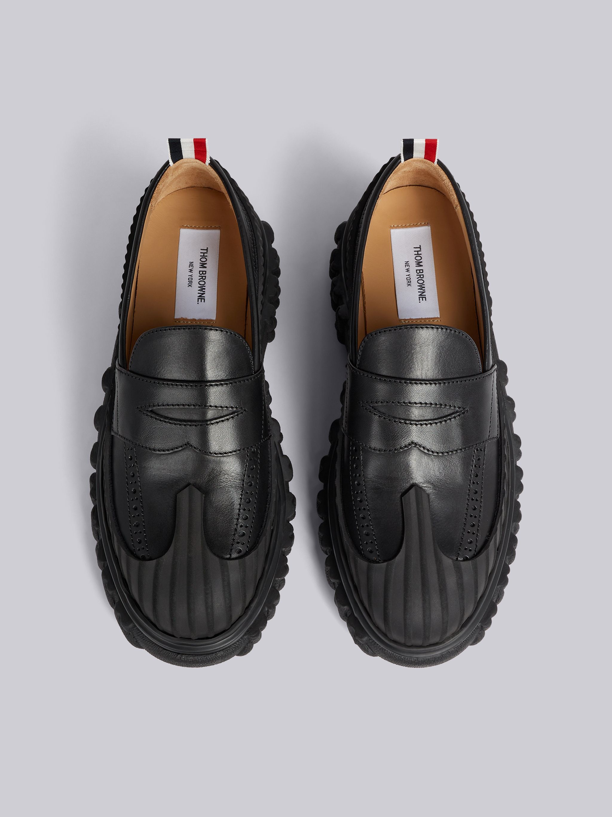 Shop Thom Browne Ridged Penny Loafers In Black