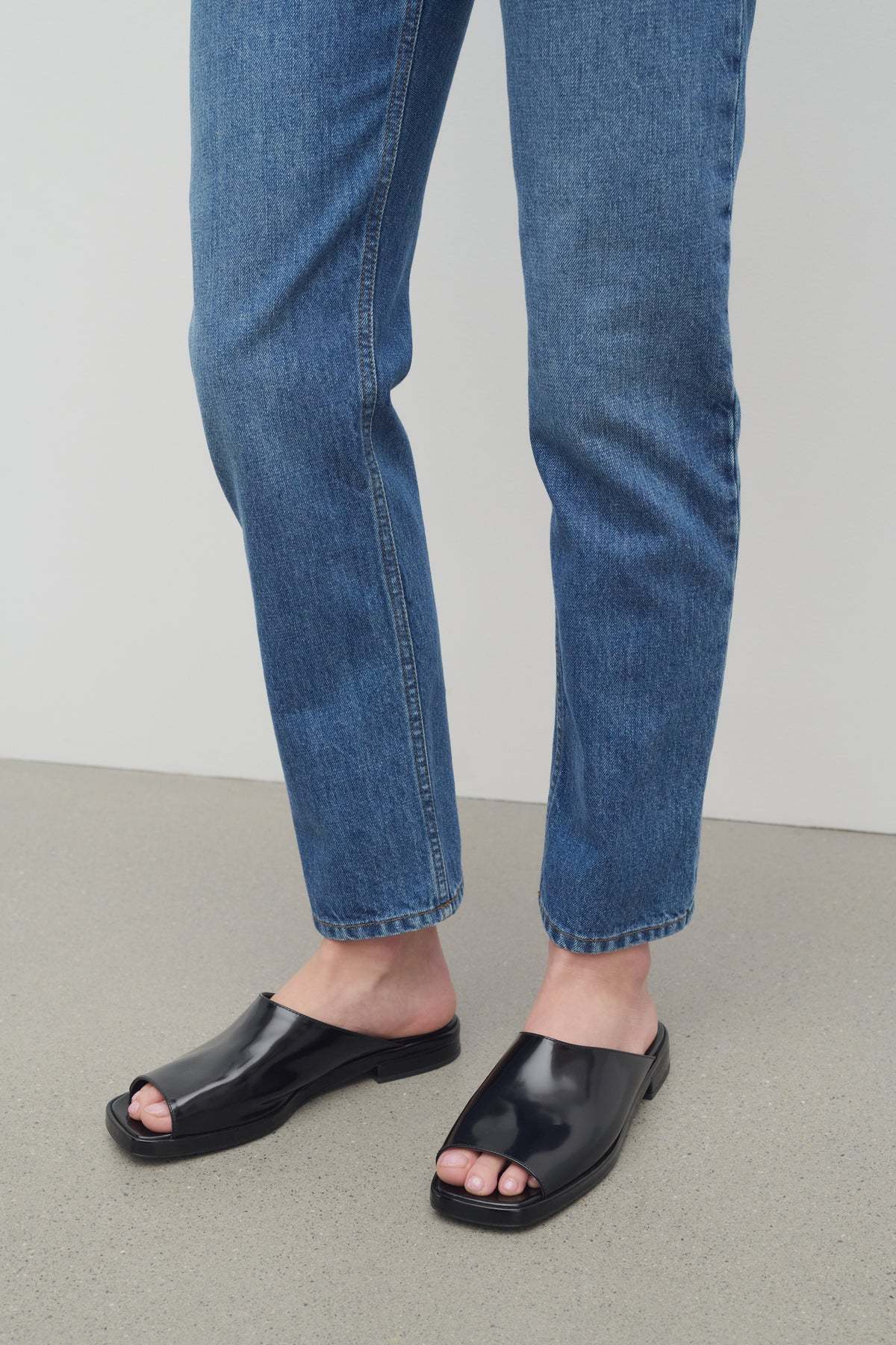 The Row Emi Leather Flat Mule Sandals In Black