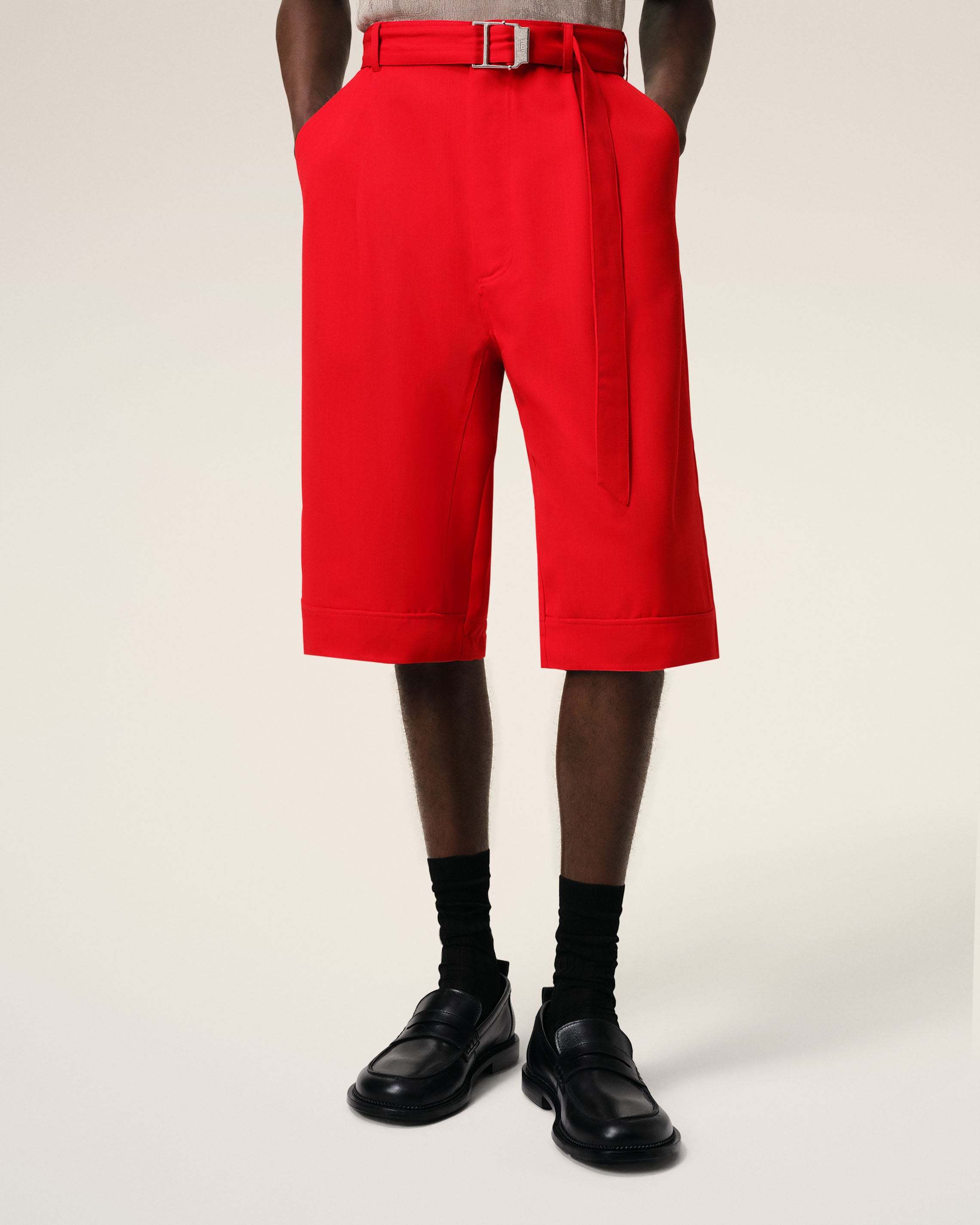 AMI ALEXANDRE MATTIUSSI AMI LOGO EMBOSSED SLIP-ON LOAFERS