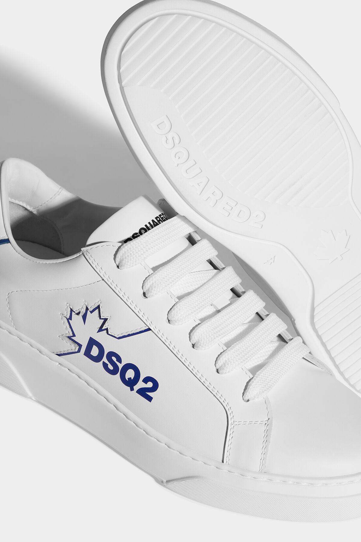Shop Dsquared2 Logo-embellished Sneakers In White