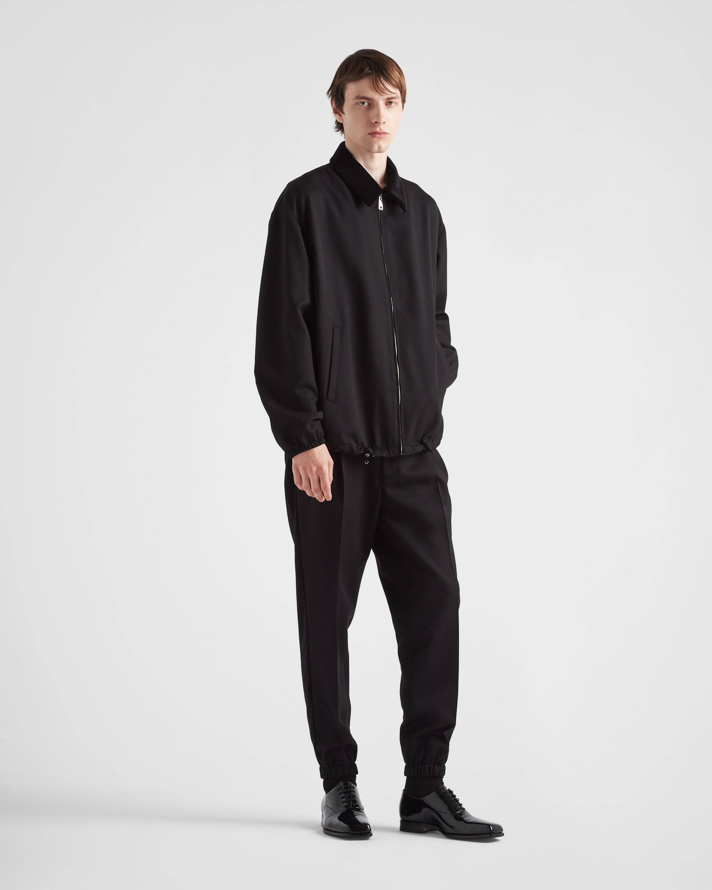 Prada Pressed-crease Velvet Tapered Trousers In Black
