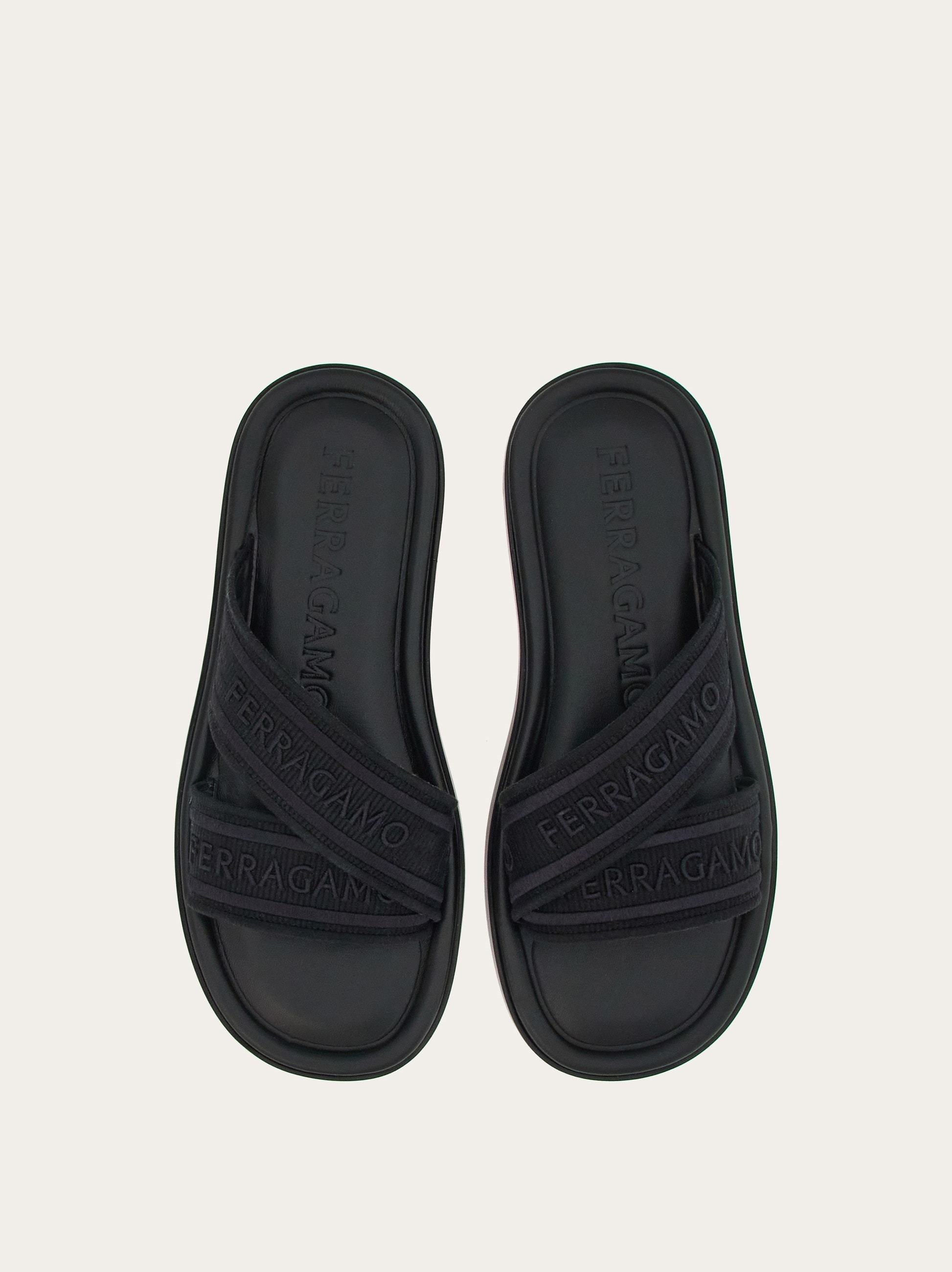 Ferragamo Logo-print Slip-on Style Slides In Black