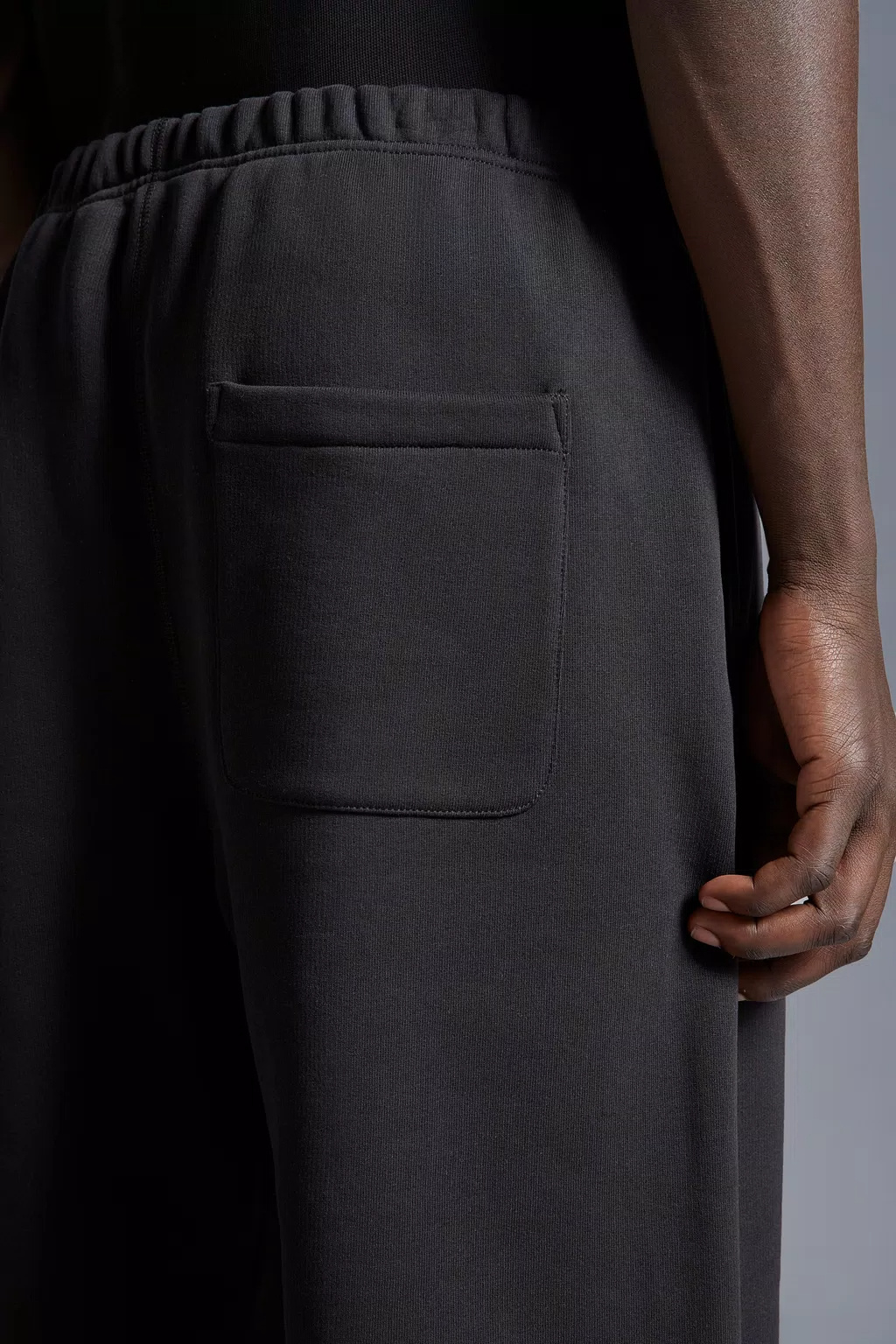 Moncler Logo Sticker Sweatpants In Black