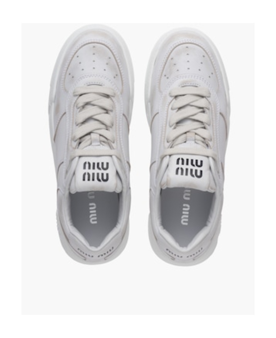 Miu Miu Bleached Leather Sneakers In White