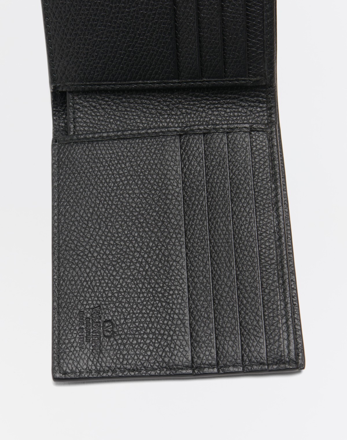 Valentino Garavani Textured Leather Wallet With Subtle Logo Detail In Black