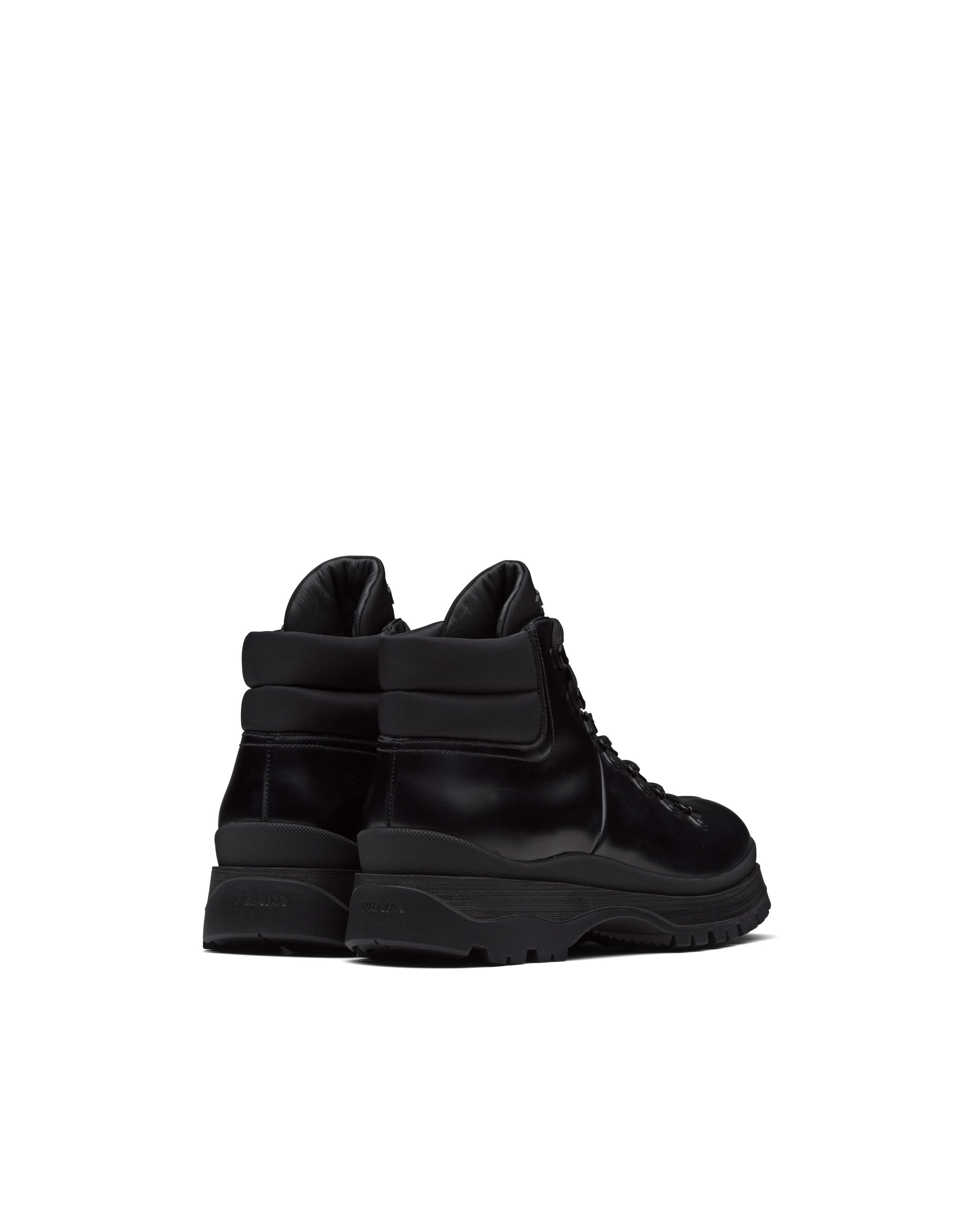 Prada Brixxen Ankle-length Boots In Black