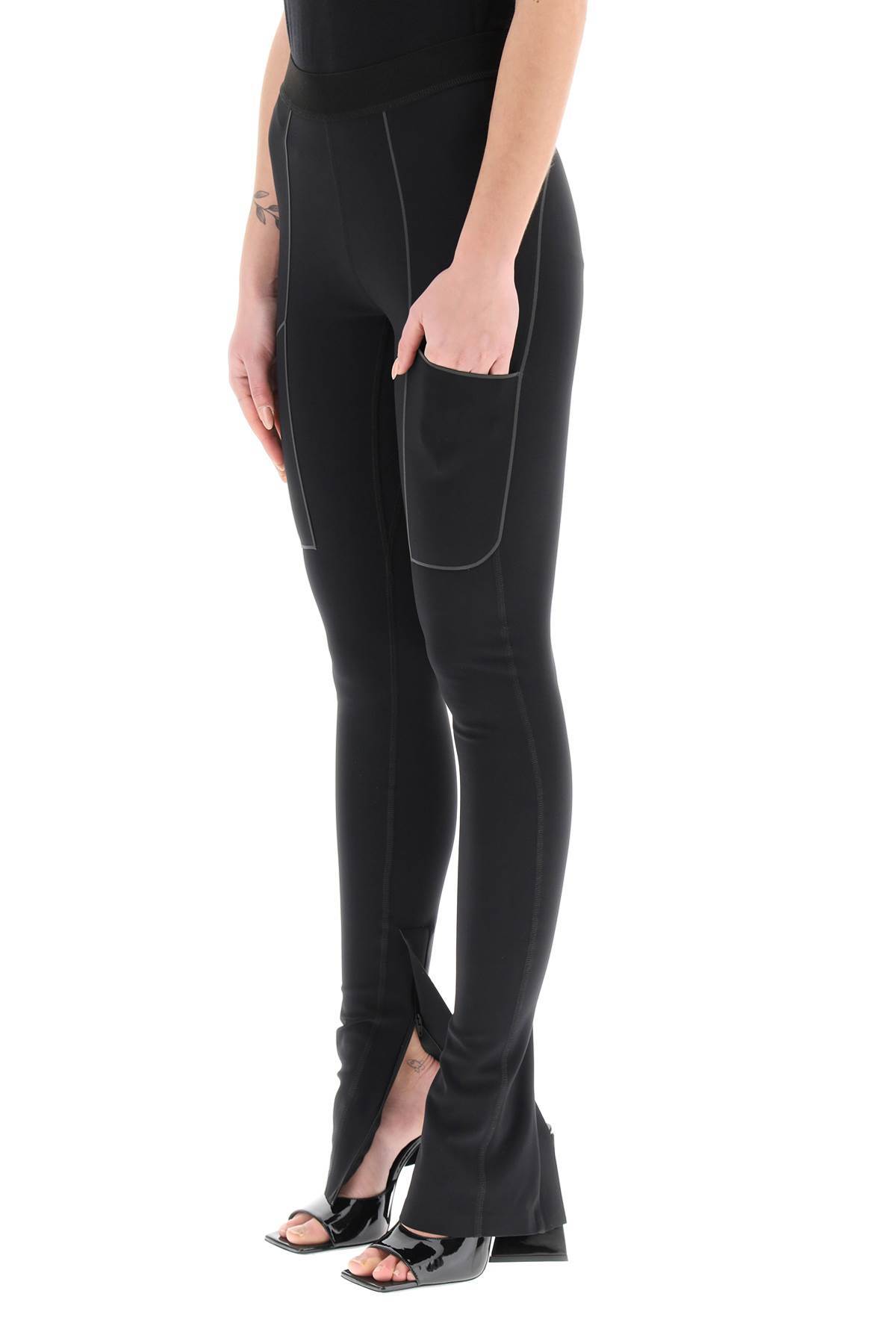 Coperni Stretch-design Slit Leggings In Black