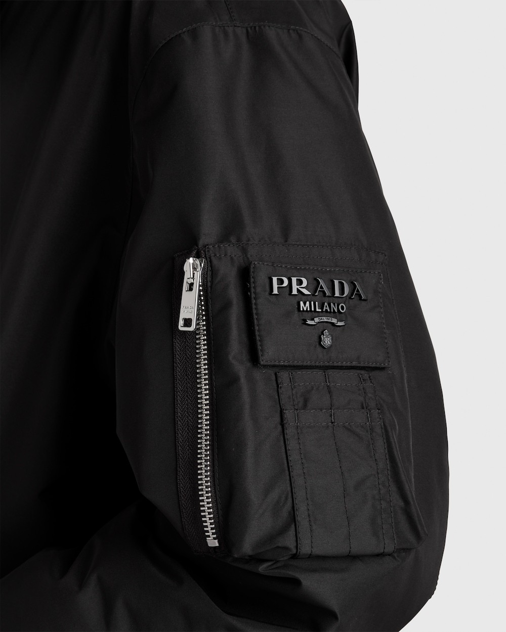 Prada Logo-lettering Coat In Black
