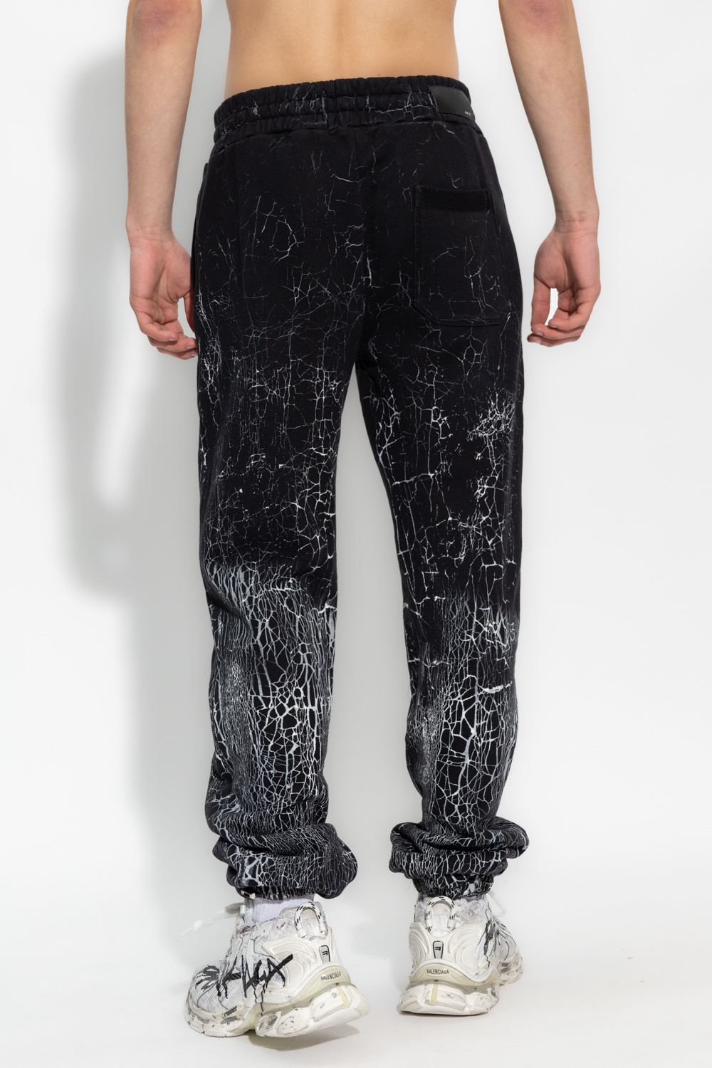 Amiri Cracked-dye Logo Track Pants In Black