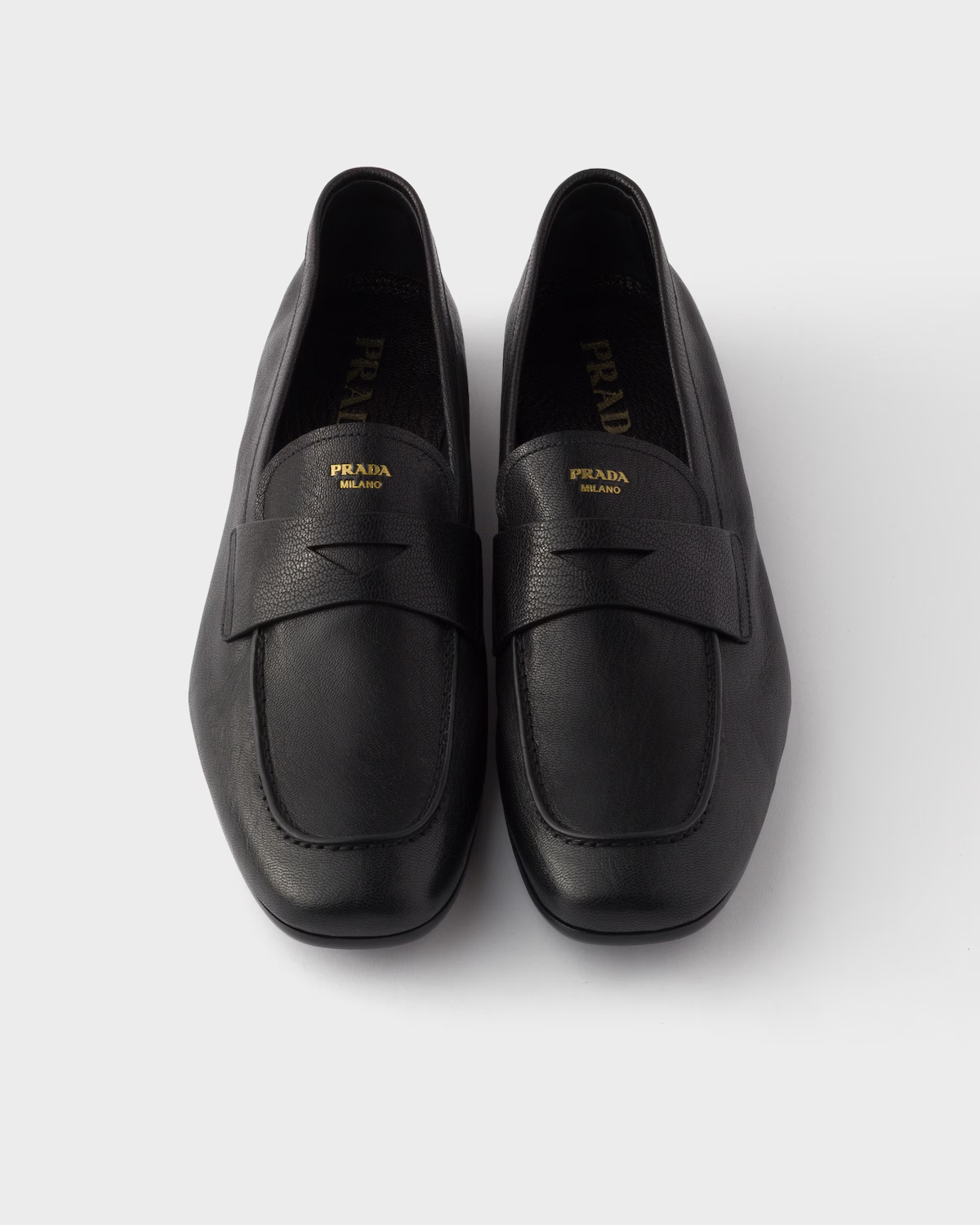 Prada Leather Band Logo Loafers In Black