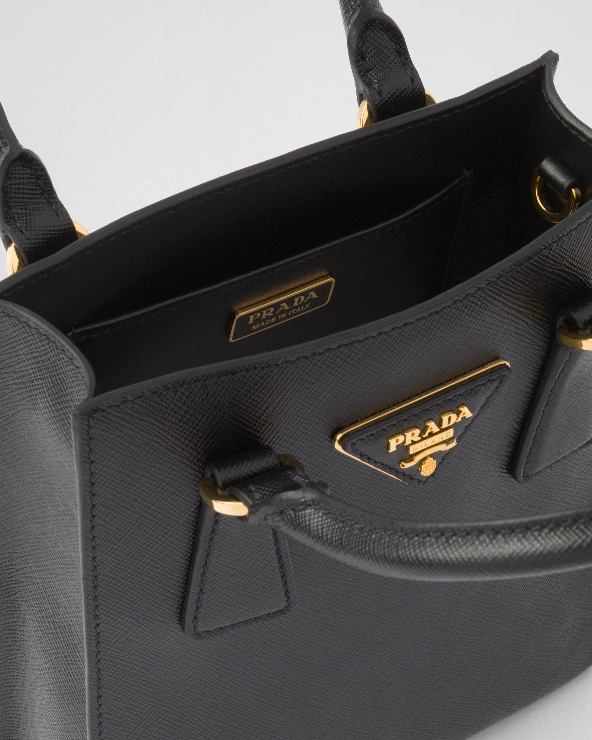 Shop Prada Saffiano Leather Handbag In Black