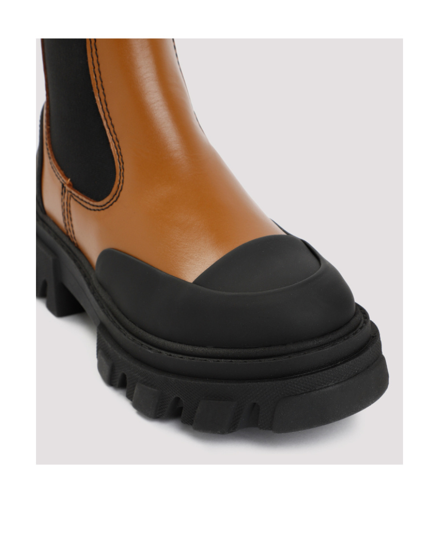 Shop Ganni Cleated Low Leather Chelsea Boots In Black