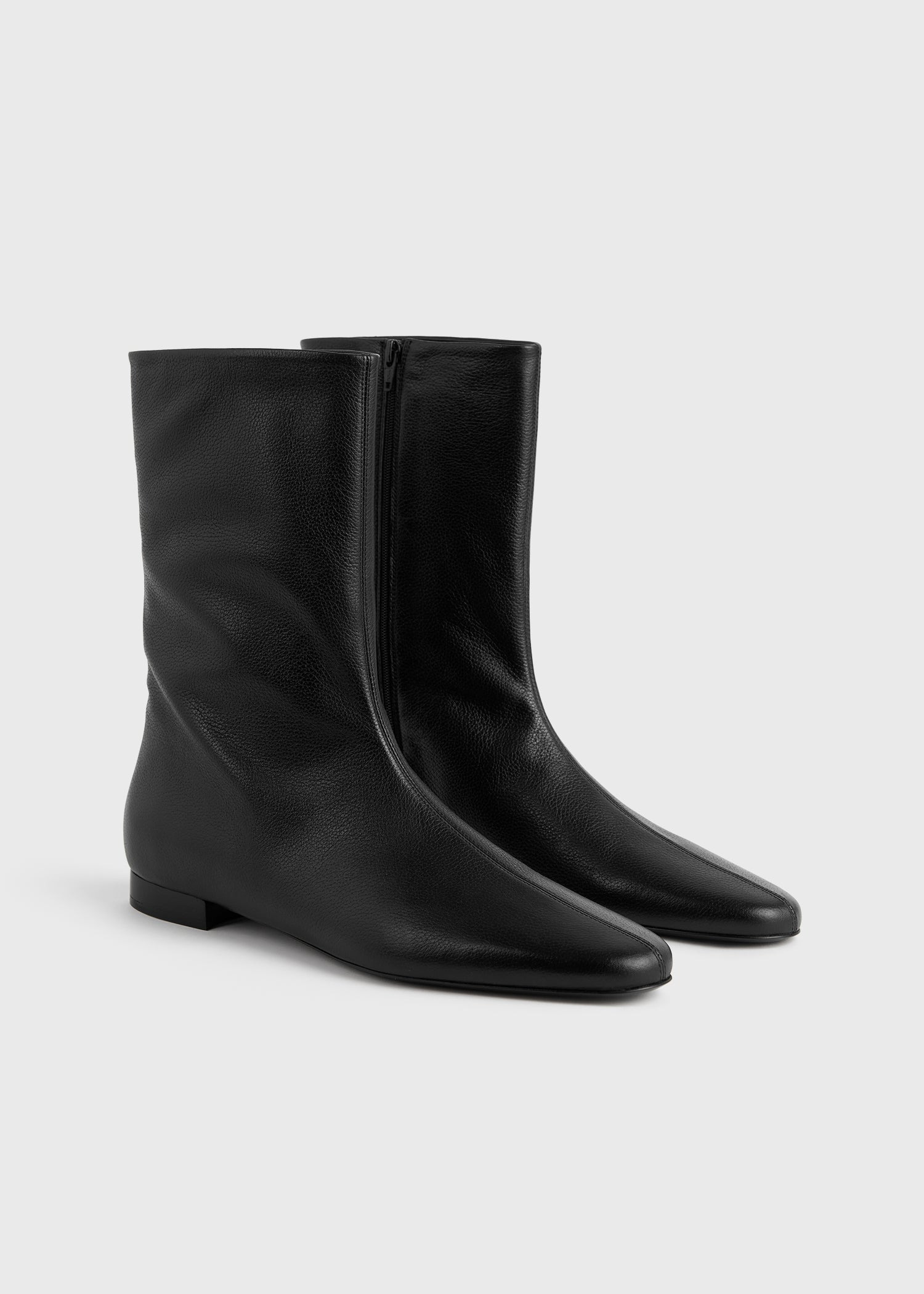 Totême Round-toed Ankle Boots In Black