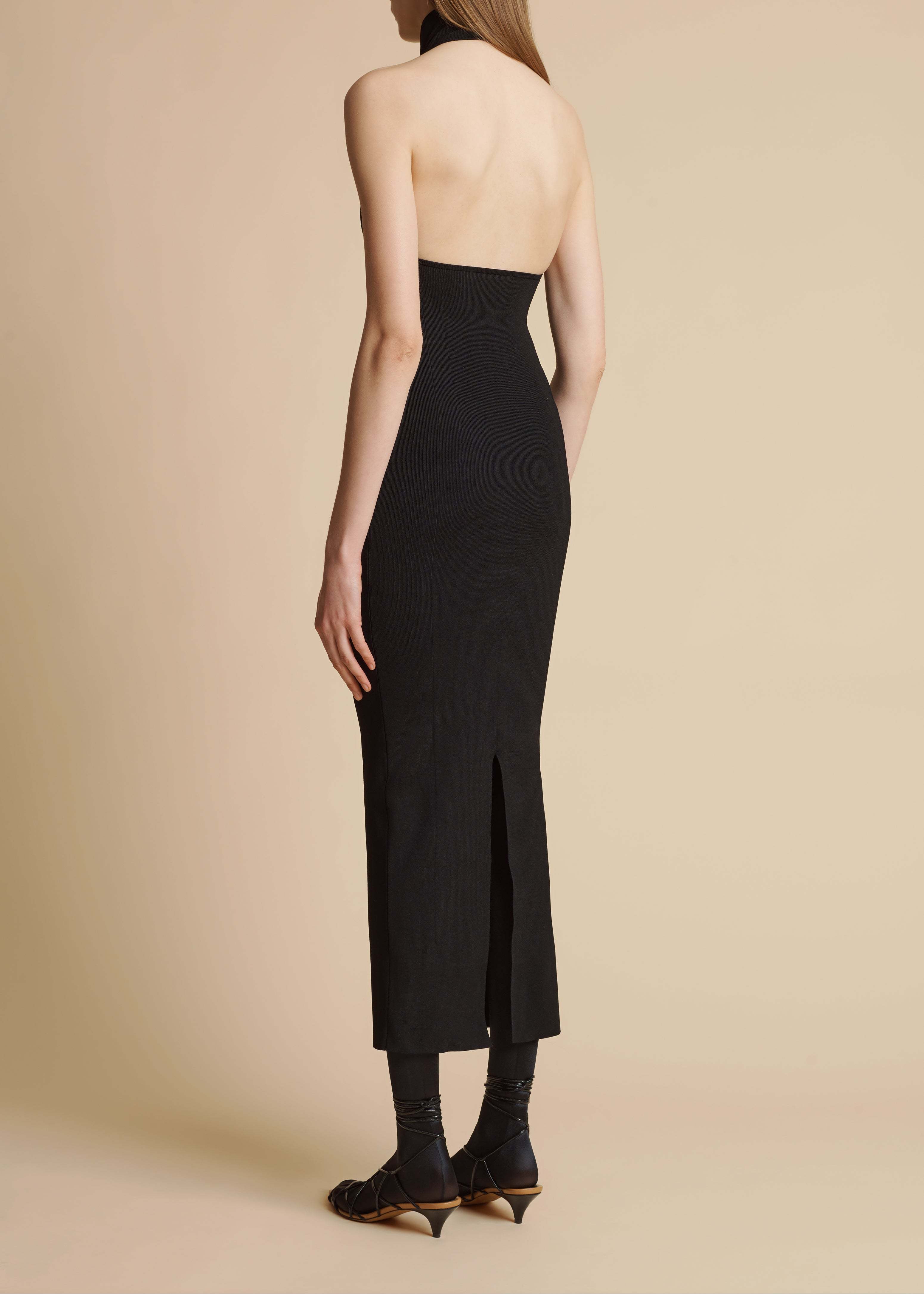 Shop Khaite The Suzanne Ribbed Midi Dress In Black