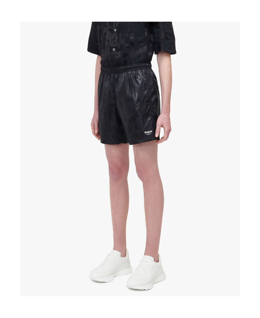 Alexander Mcqueen Solid Color Swim Shorts With Graffiti Print In Black