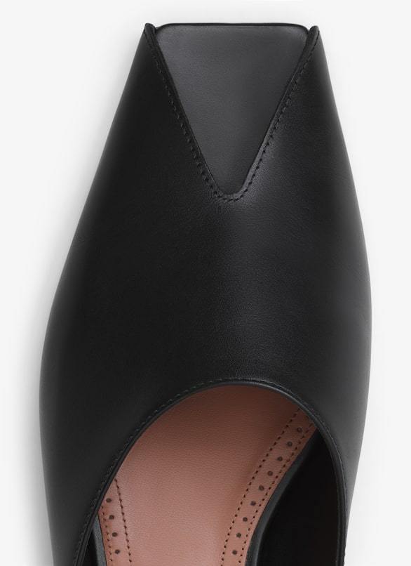 Alaïa Spike Leather Slippers In Black