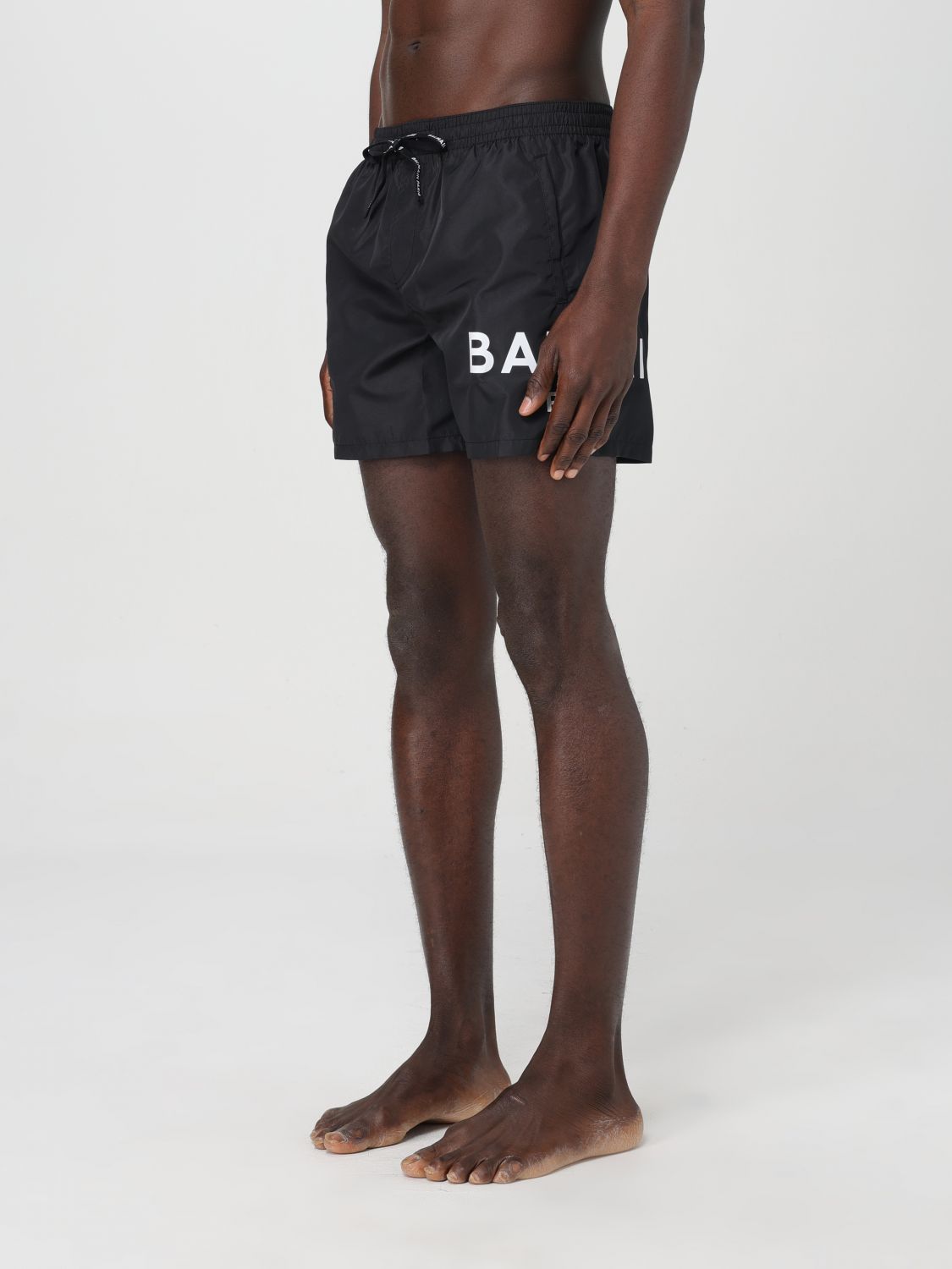 BALMAIN LOGO-PRINT SWIM SHORTS