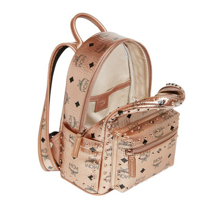Mcm Logo Printed Rivet Backpack In Nude