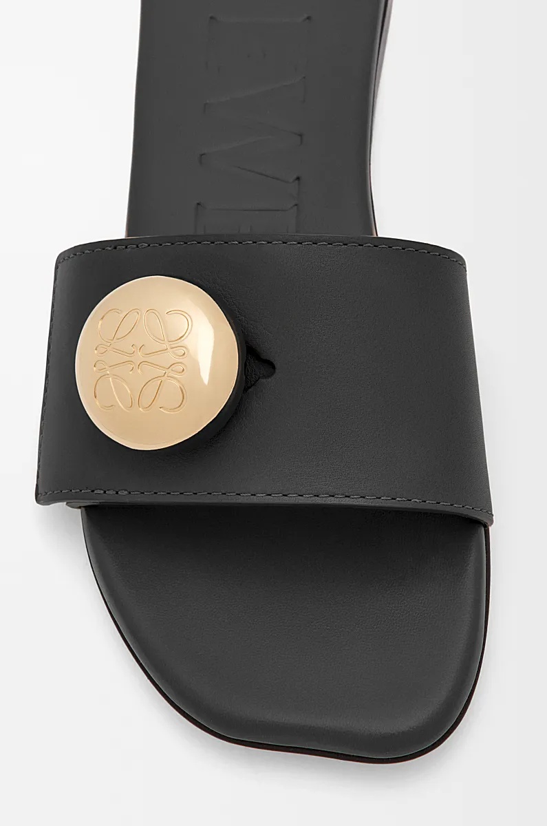 Loewe Elegant Black Calf Leather Sandals With Gold Embellishment In Black