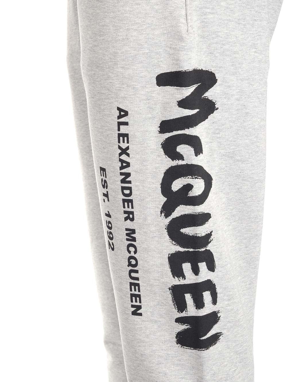 Alexander Mcqueen Graffiti-print Track Pants In Gray