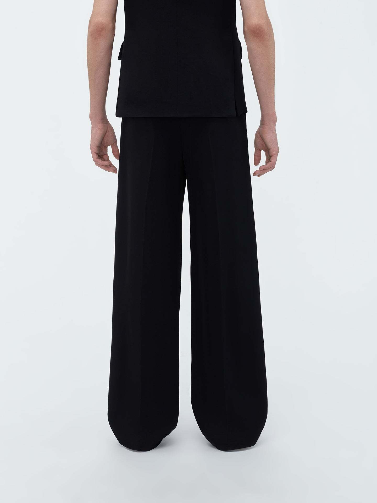AMIRI AMIRI LOGO PATCH TAPERED LEG TROUSERS