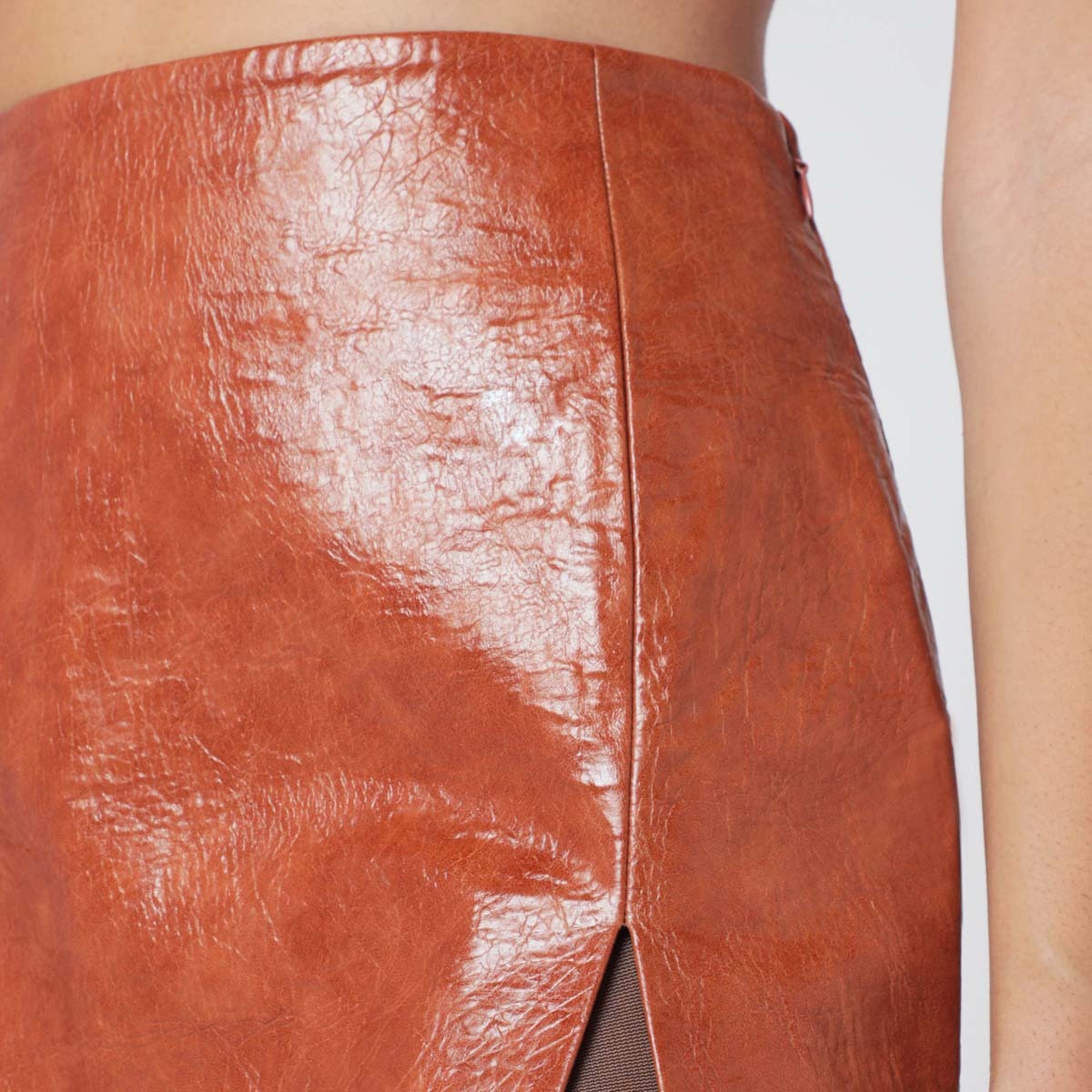 The Andamane Mini Skirt With Leather Effect And Side Slit In Orange
