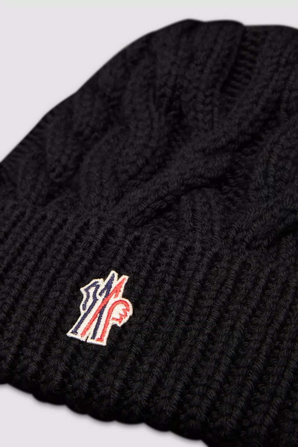 Moncler Logo Patch Wool Beanie In Black