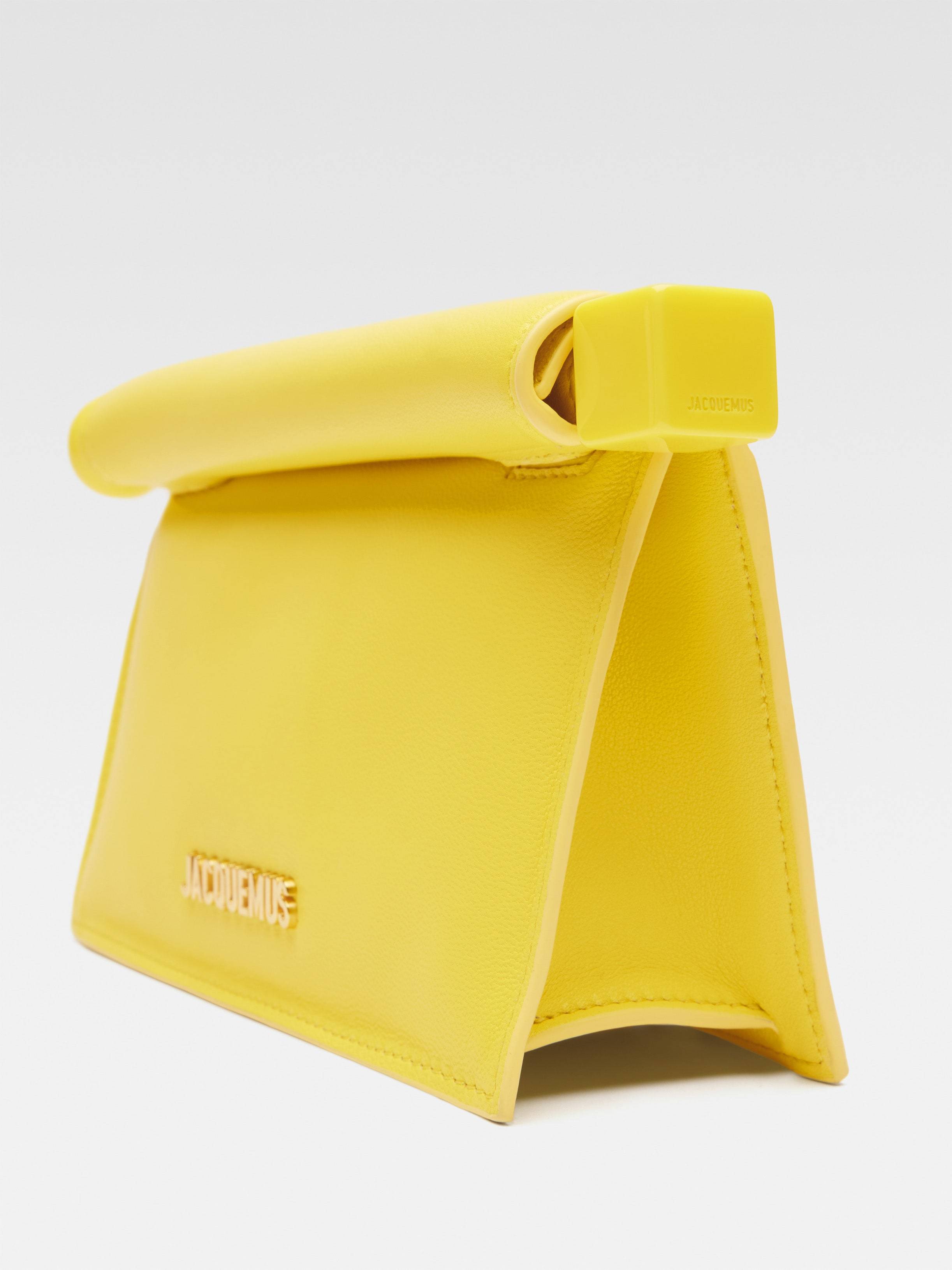 Shop Jacquemus La Petite Pochette Shoulder Bag In Yellow