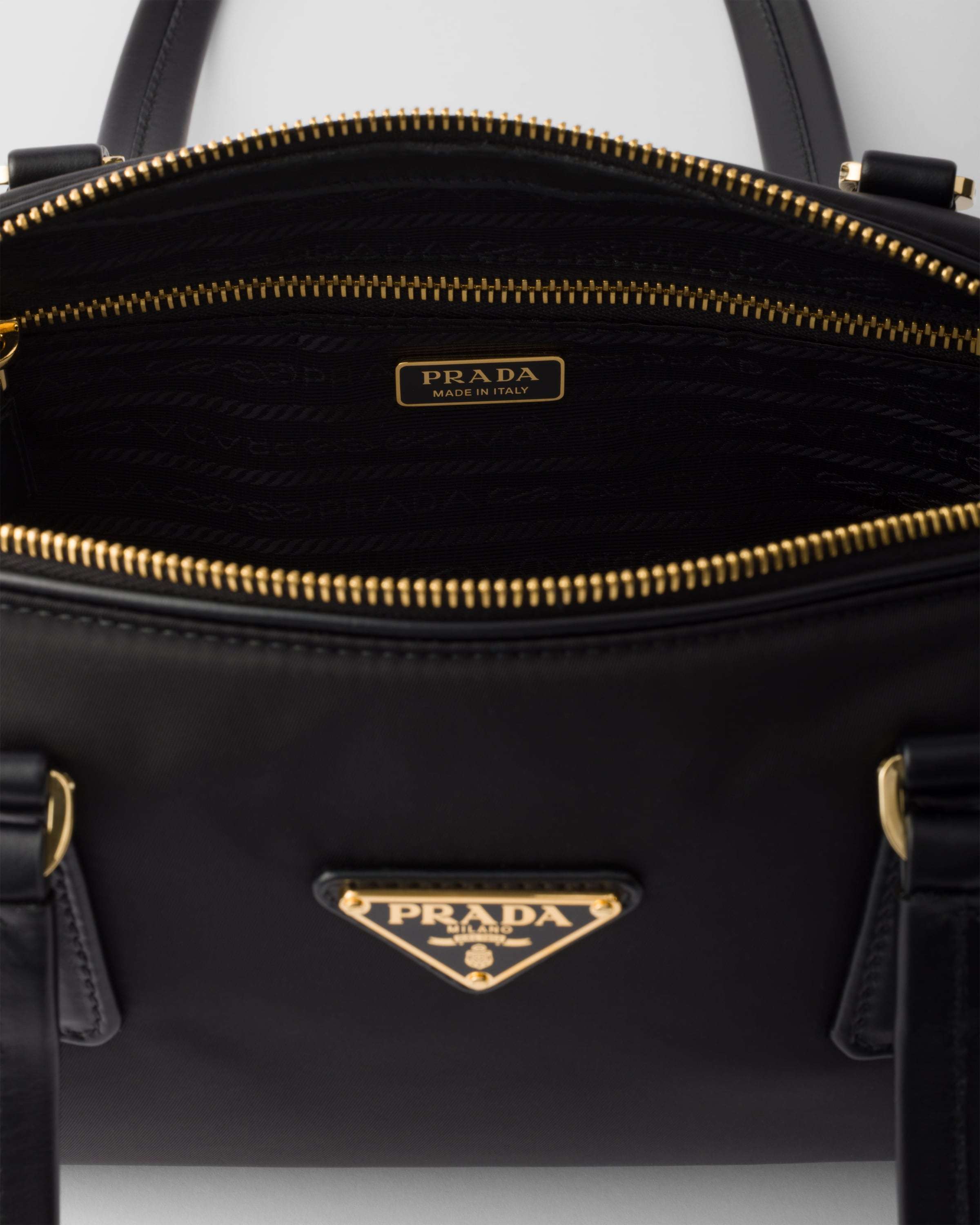 Shop Prada Re-nylon And Leather Medium Top-handle Bag In Black