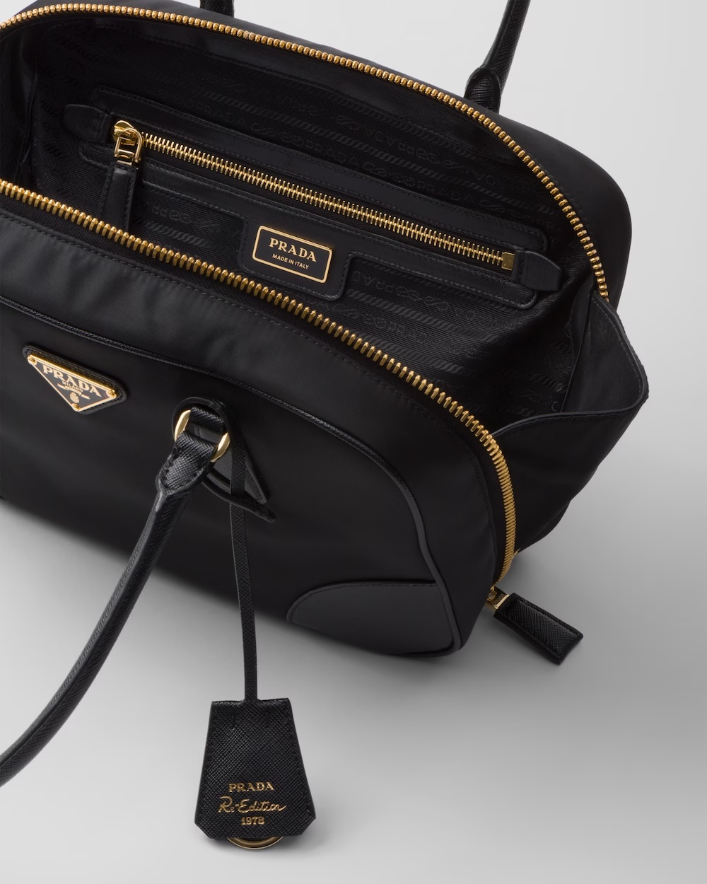 Prada Re-edition 1978 Medium Re-nylon And Saffiano Leather Two-handle Bag In Black