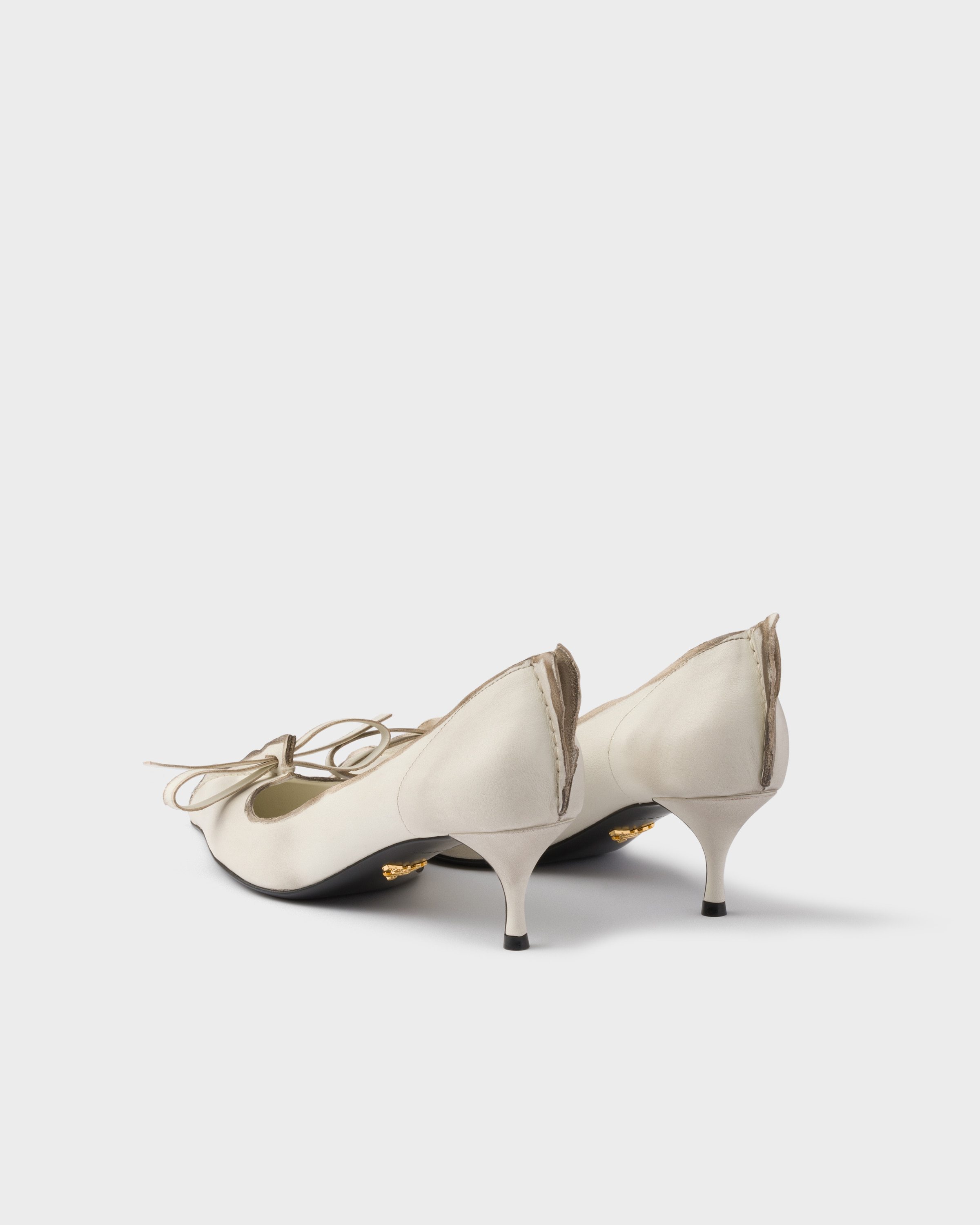 Prada Exposed Seam Kitten Heel Pump In Neutral