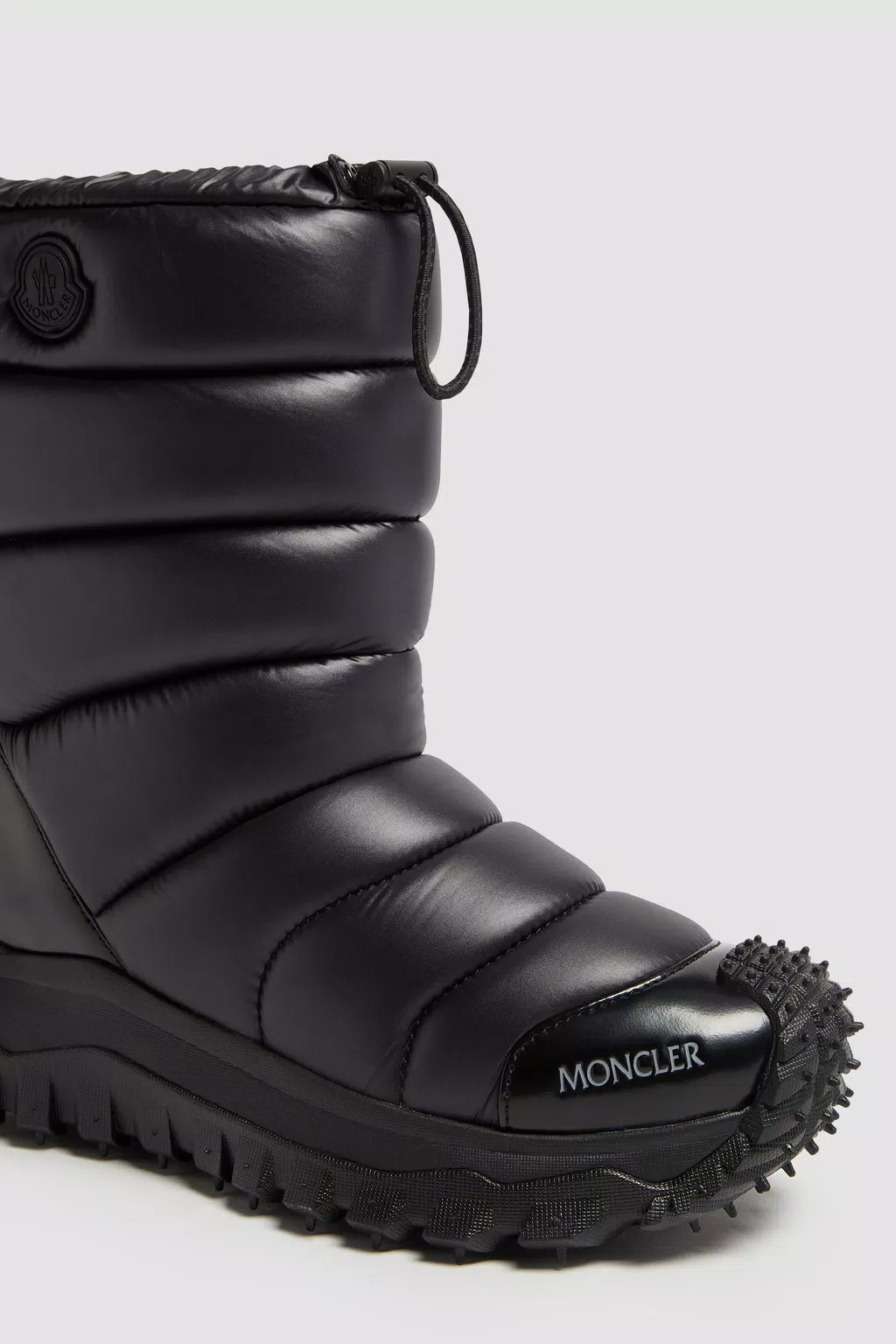 Moncler Trailgrip Appliquéd Quilted Padded Glossed Leather-trimmed Shell Snow Boots In Black
