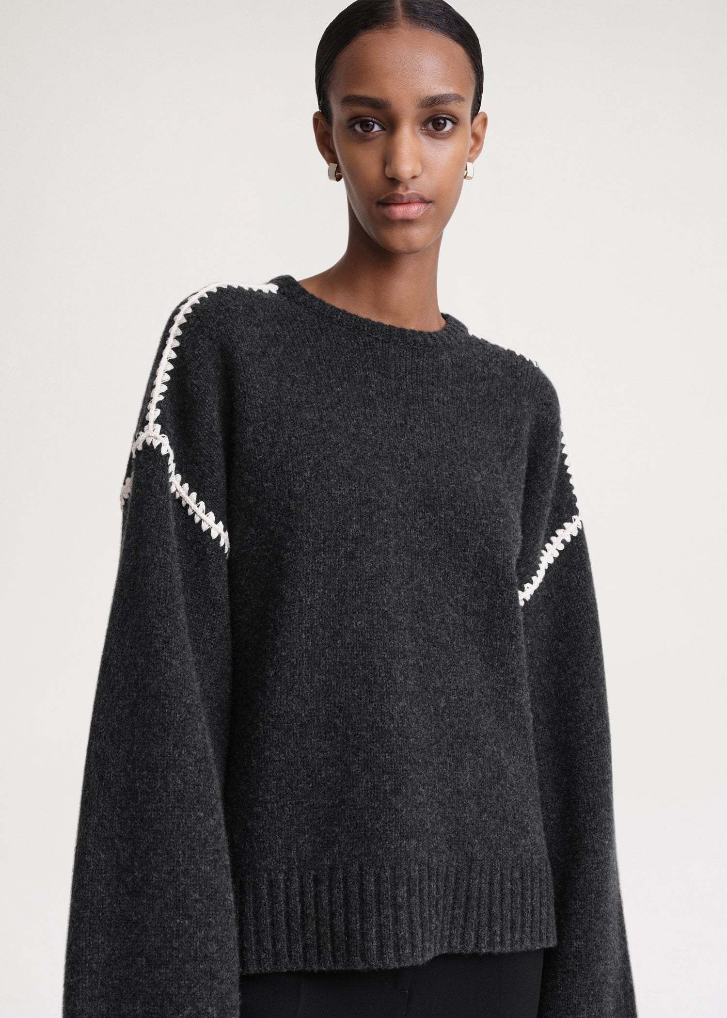 Shop Totême Whipstitched Wool Jumper In Black