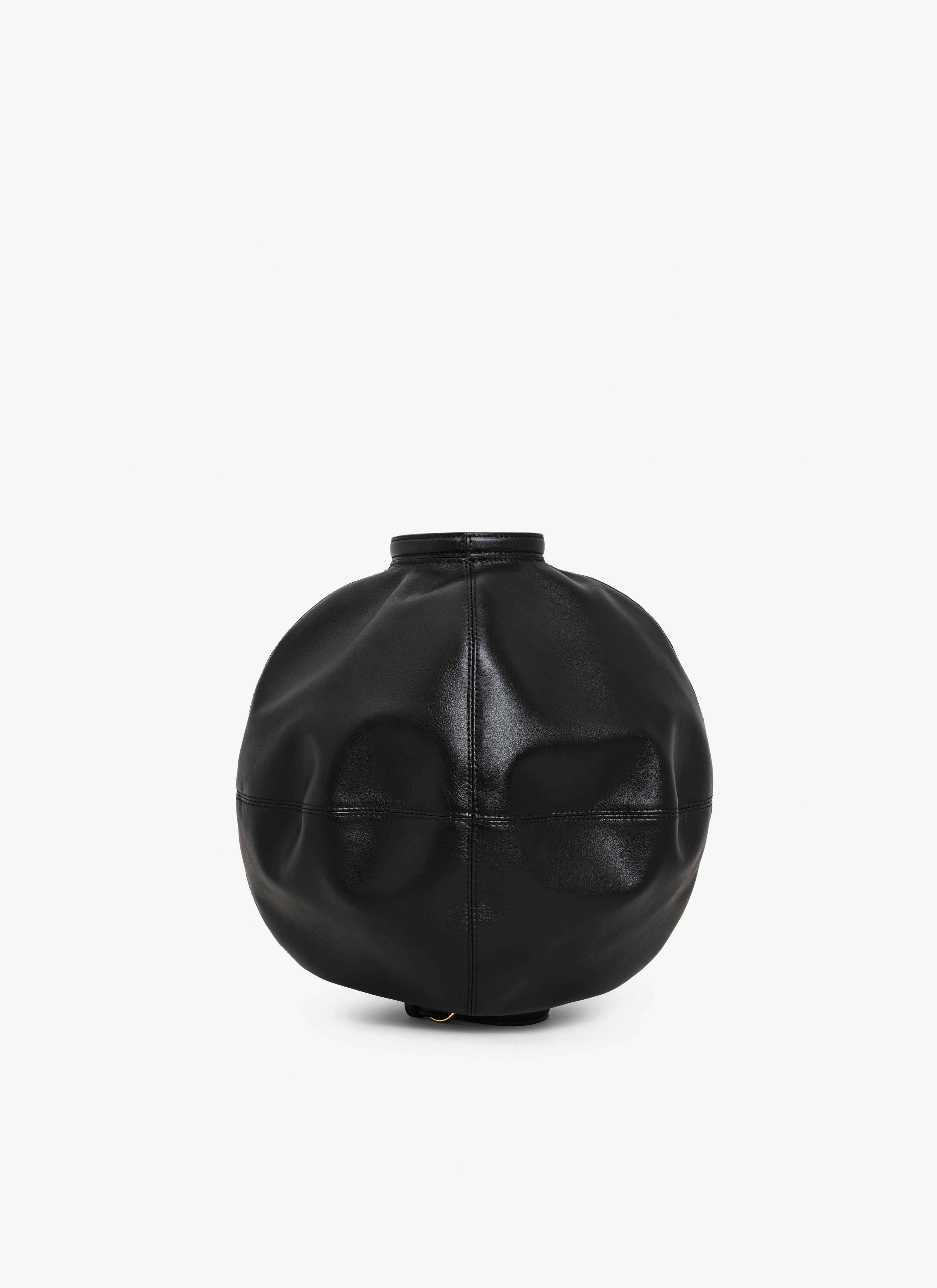 Alaïa Paneled Polished Leather Clutch In Black
