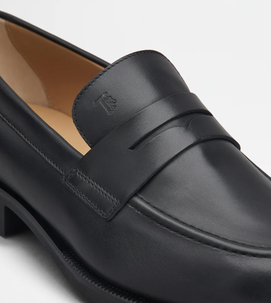 Tod's Round Toe Slip-on Loafers In Black
