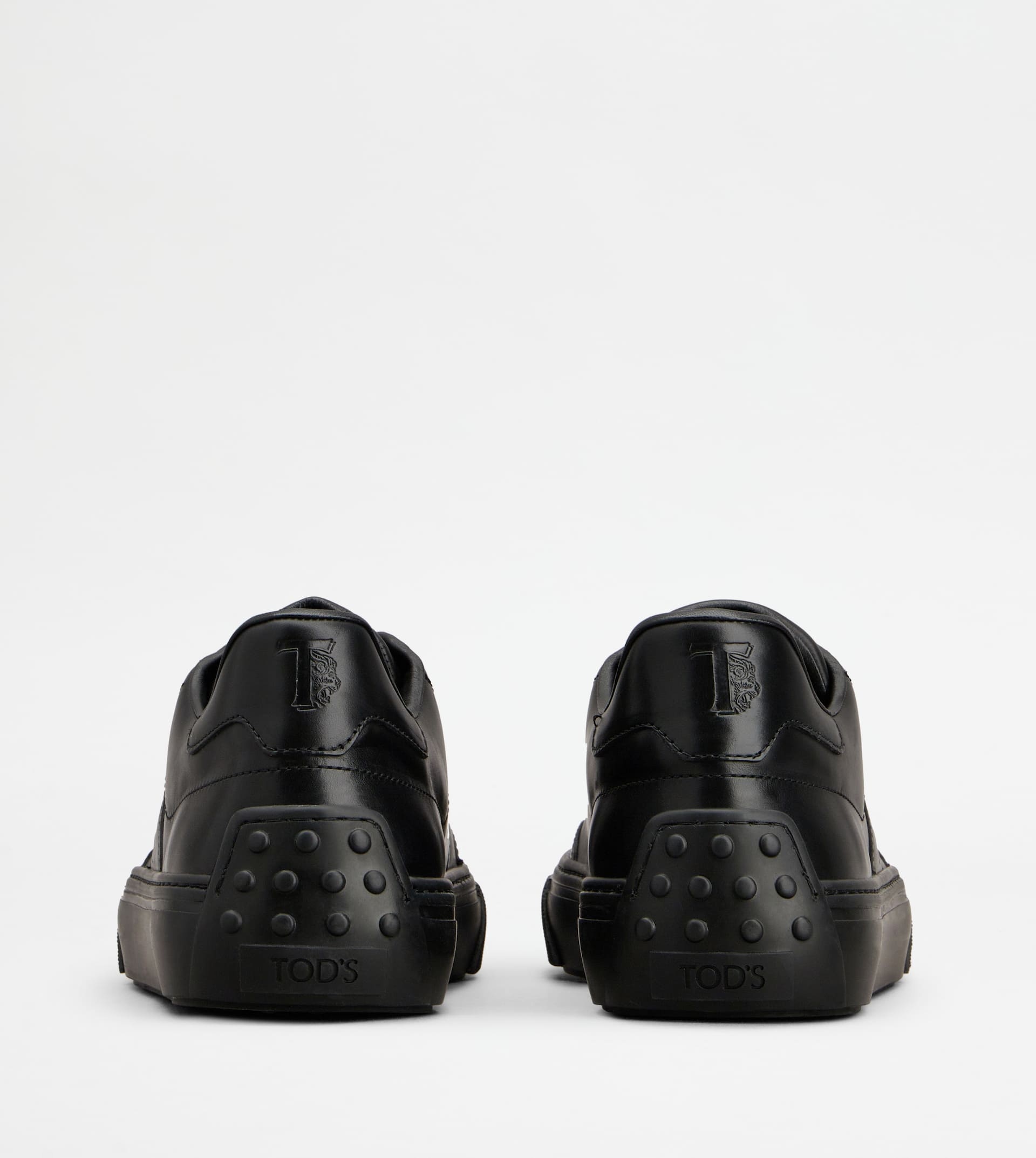 Tod's Logo-debossed Leather Sneakers In Black