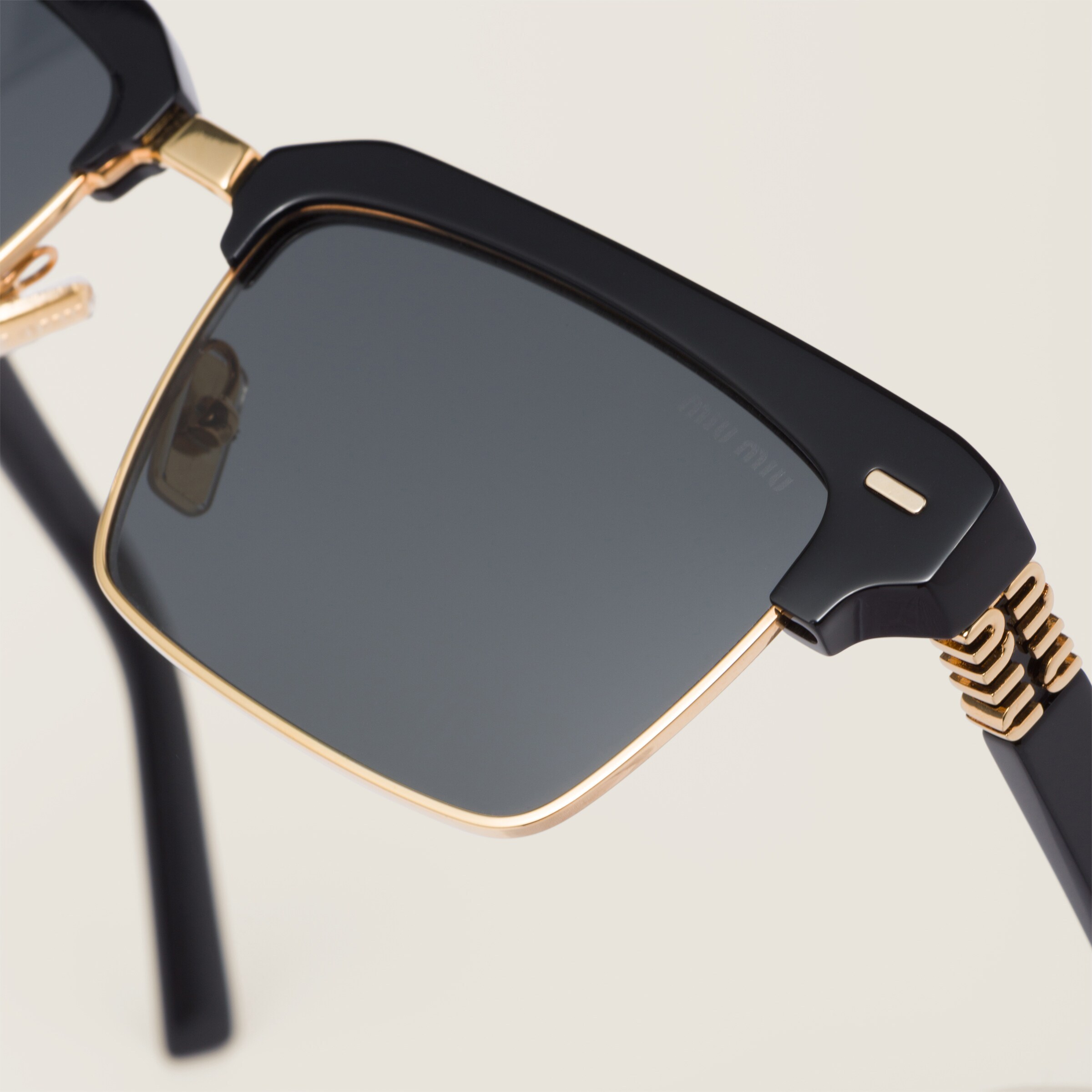 Miu Miu Logo Pattern Sunglasses In Gray