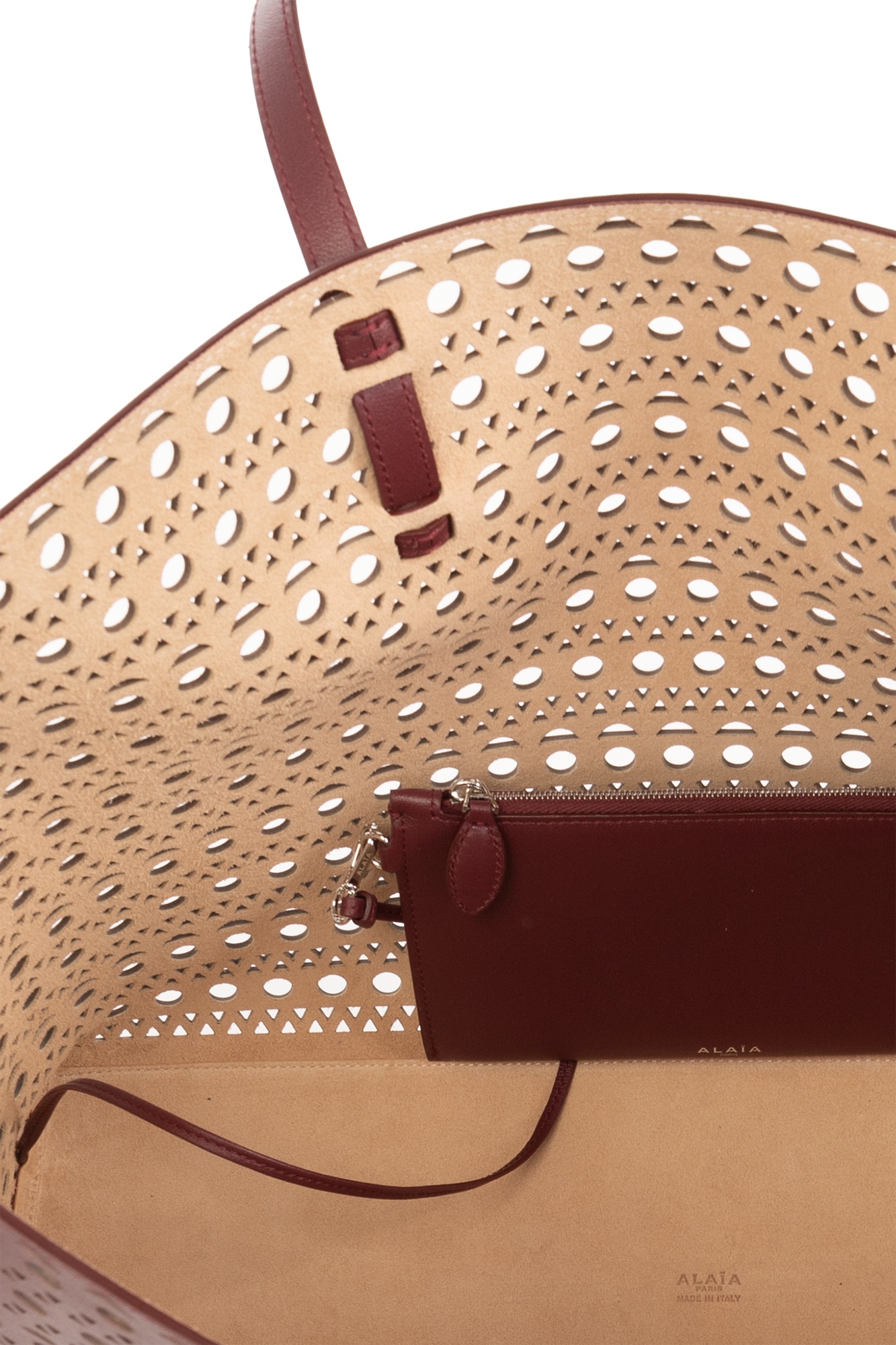 Alaïa Hollowed-out Shoulder Bag In Red