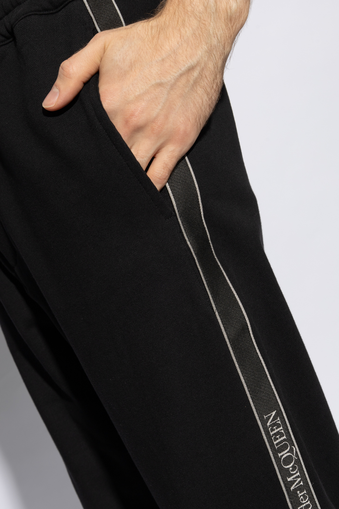 Shop Alexander Mcqueen Logo-stripe Tapered Track Pants In Black