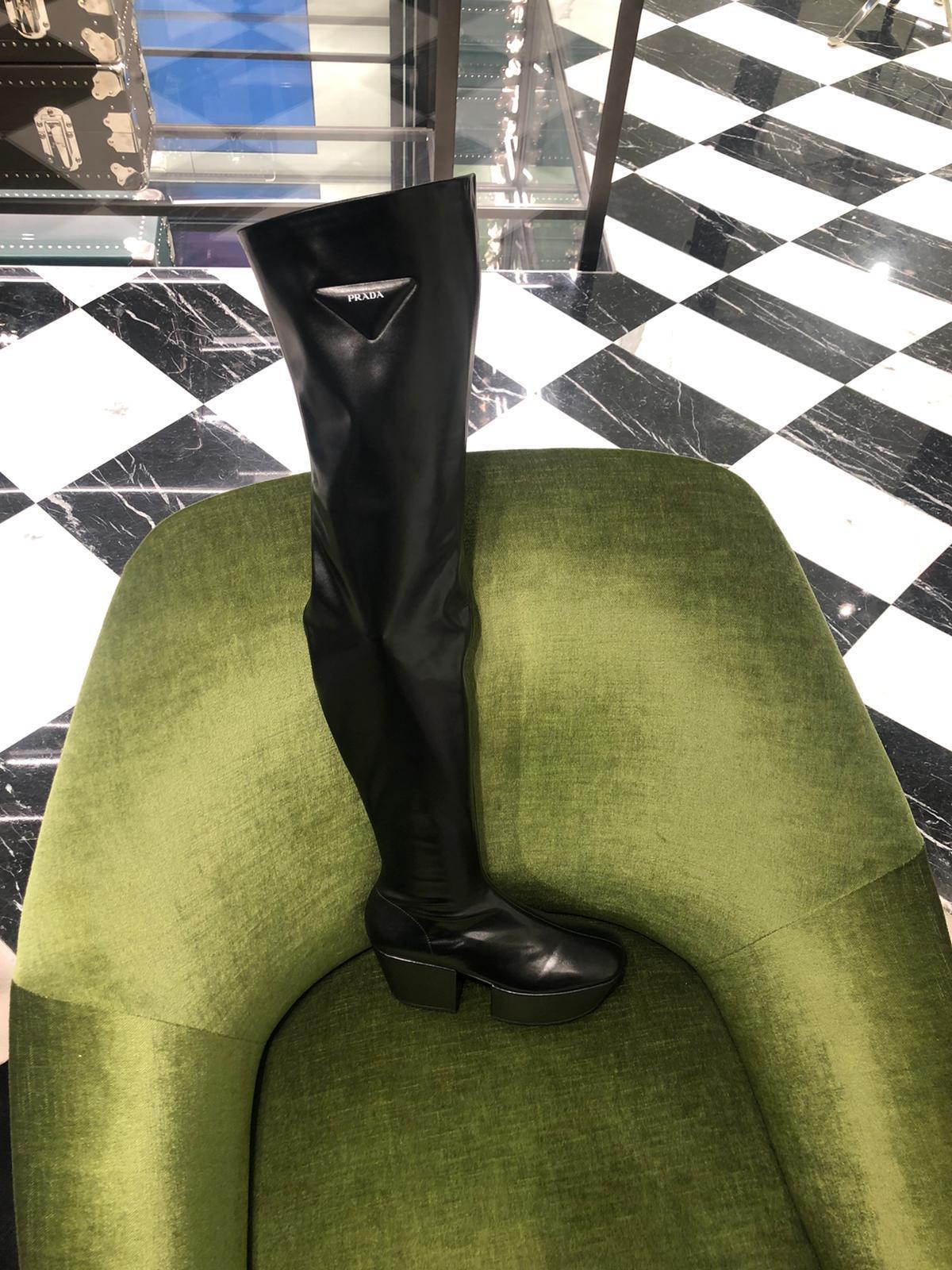 Shop Prada Thigh-high Platform Boots In Black