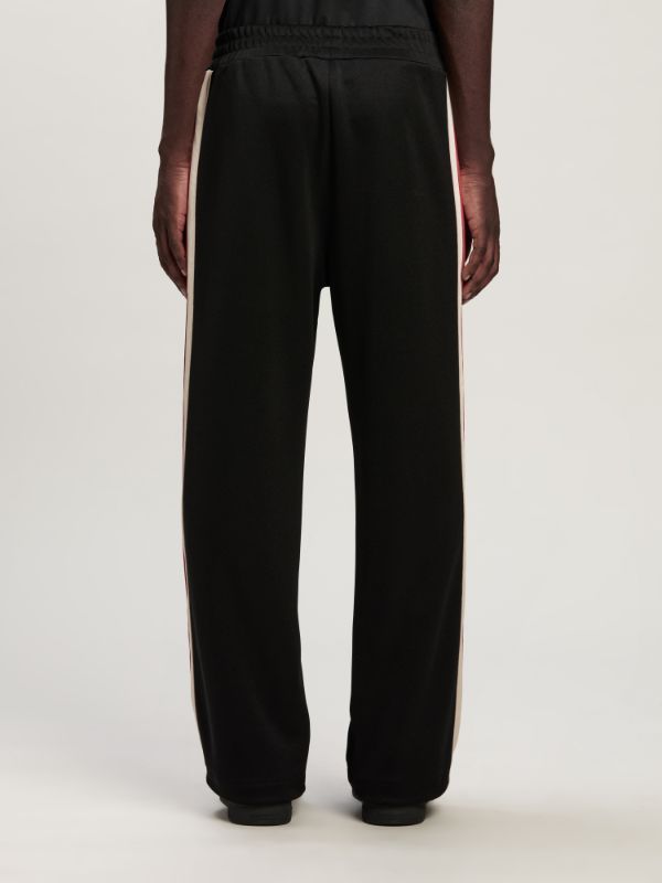 Palm Angels Monogram Embroidered Side Stripe Detailed Track Pants In Black