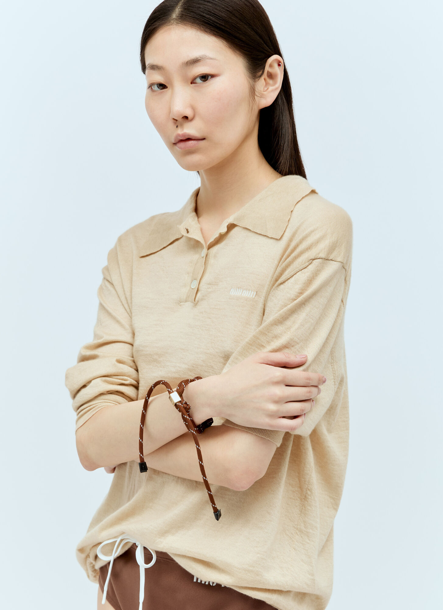 Miu Miu Logo-charm Cord Bracelet In Yellow