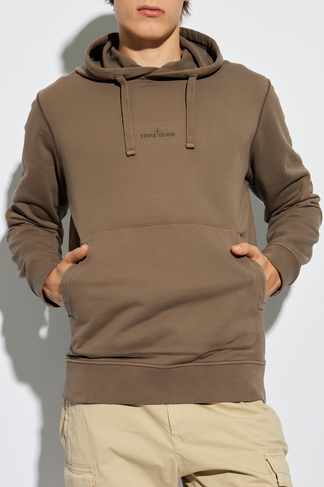 Stone Island Logo Printed Drawstring Hoodie In Brown