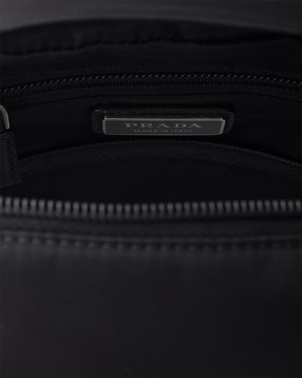 Prada Structured Leather Backpack With Logo Zipper Closure