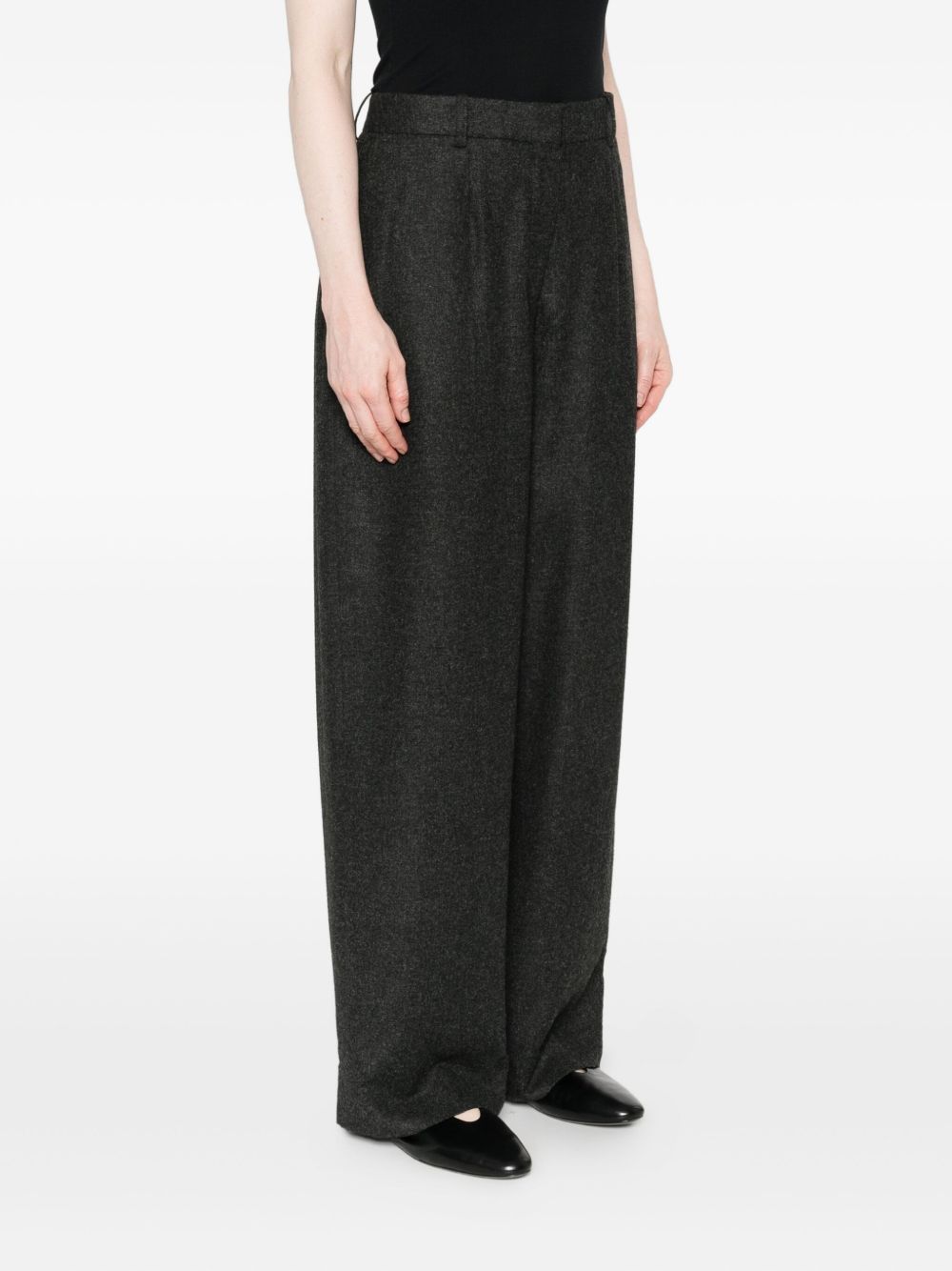 Totême Wide-leg Flannel Trousers Featuring Pockets In Black