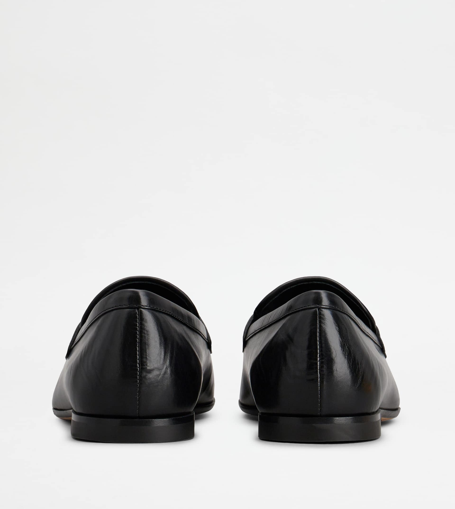 Tod's Pointed Toe Slip-on Loafers With Cut-out Detail In Black